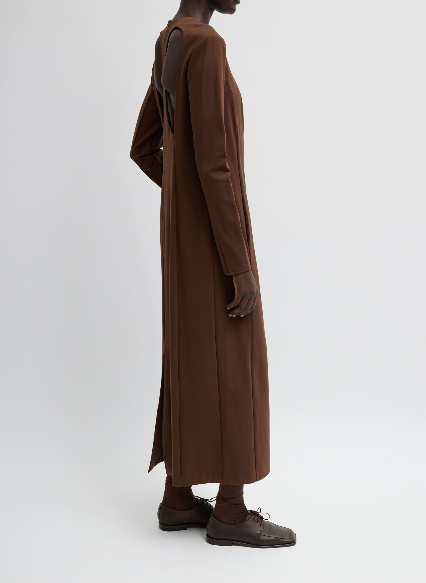 Brown Compact Ultra Stretch Knit Dress With Cut Out Back - long sleeve maxi dress, side view on model