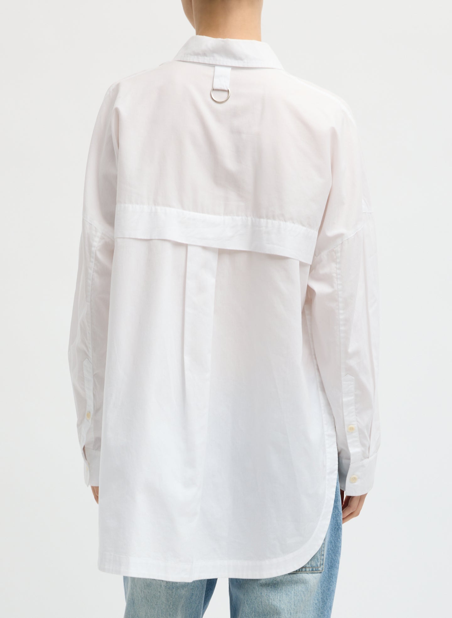 White Gabe Shirt - oversized button down top, back view on model
