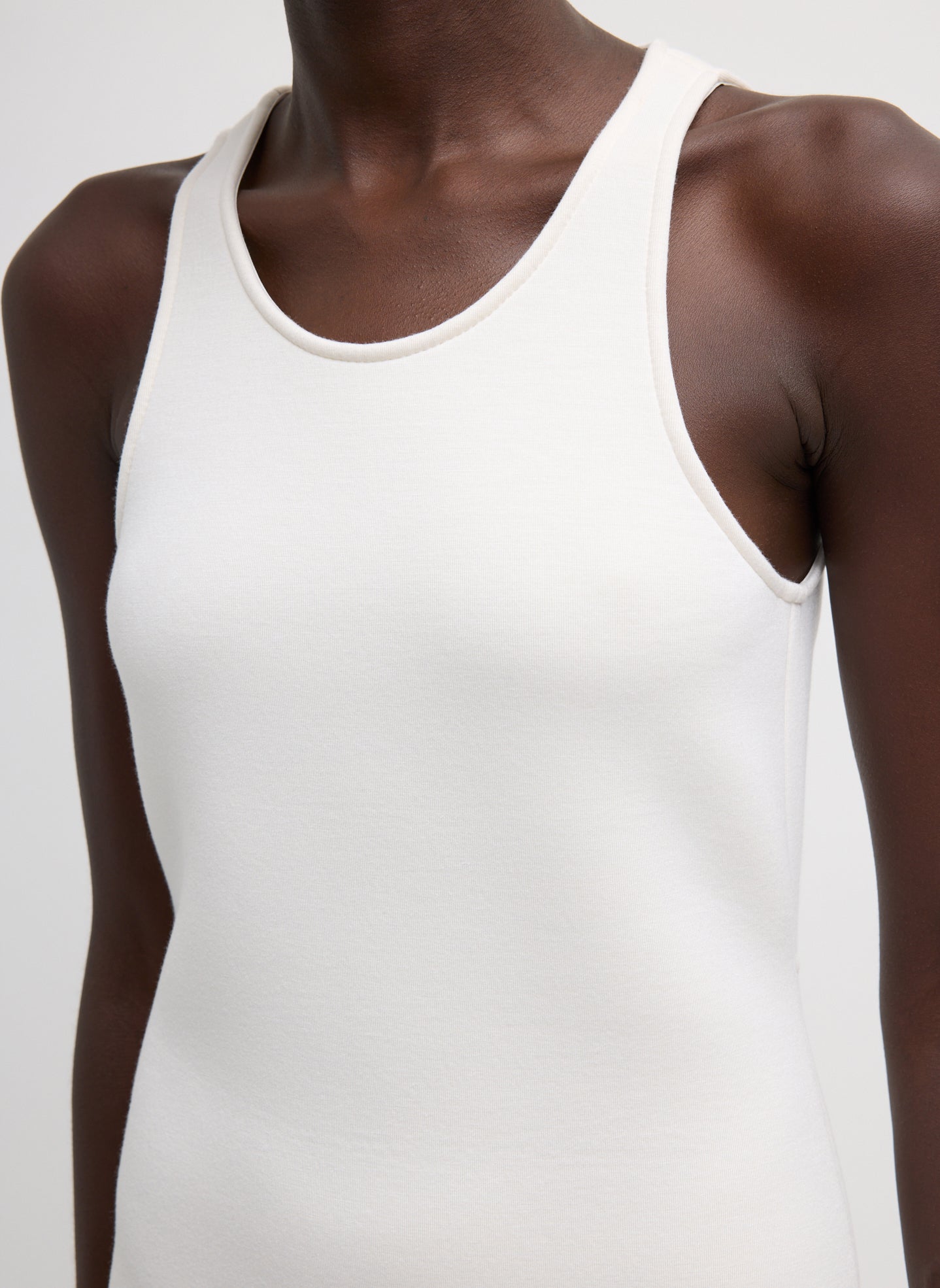Ivory Bonded Viscose Sculpted Sleeveless Tunic - closeup of neckline