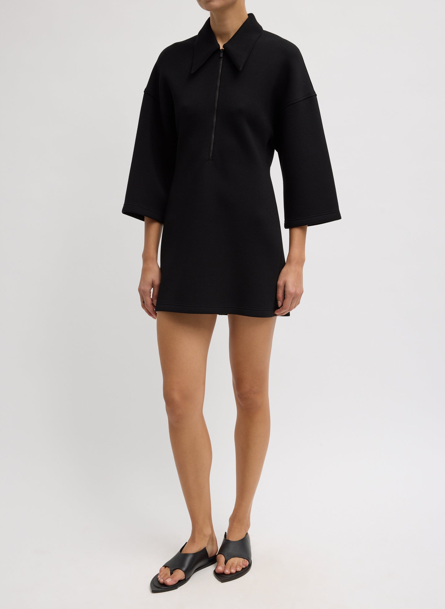 Black Bonded Viscose Zip Front Short Sleeve Slim Tunic - front view on model