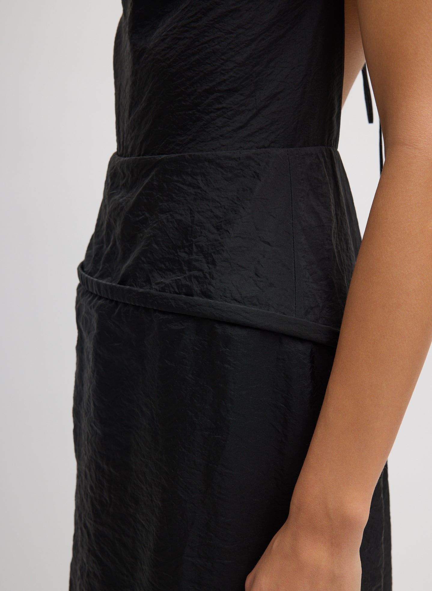 Black Chassis Hoop Strappy Dress - closeup on crinkled fabric detail