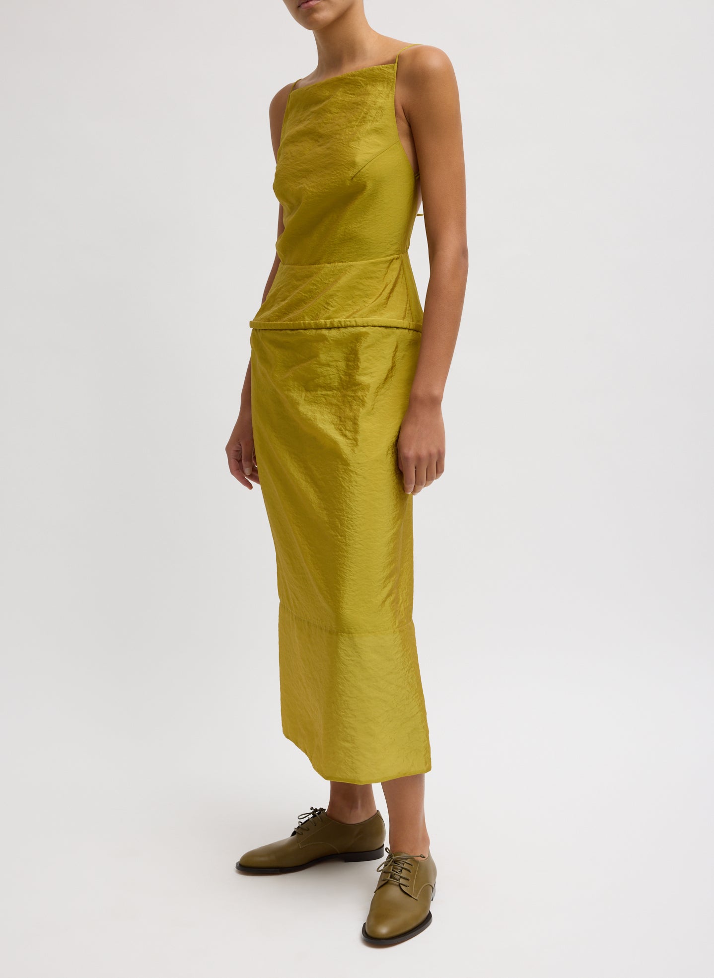 Dijon Chassis Hoop Strappy Dress - mustard yellow straight neck dress, side view on model