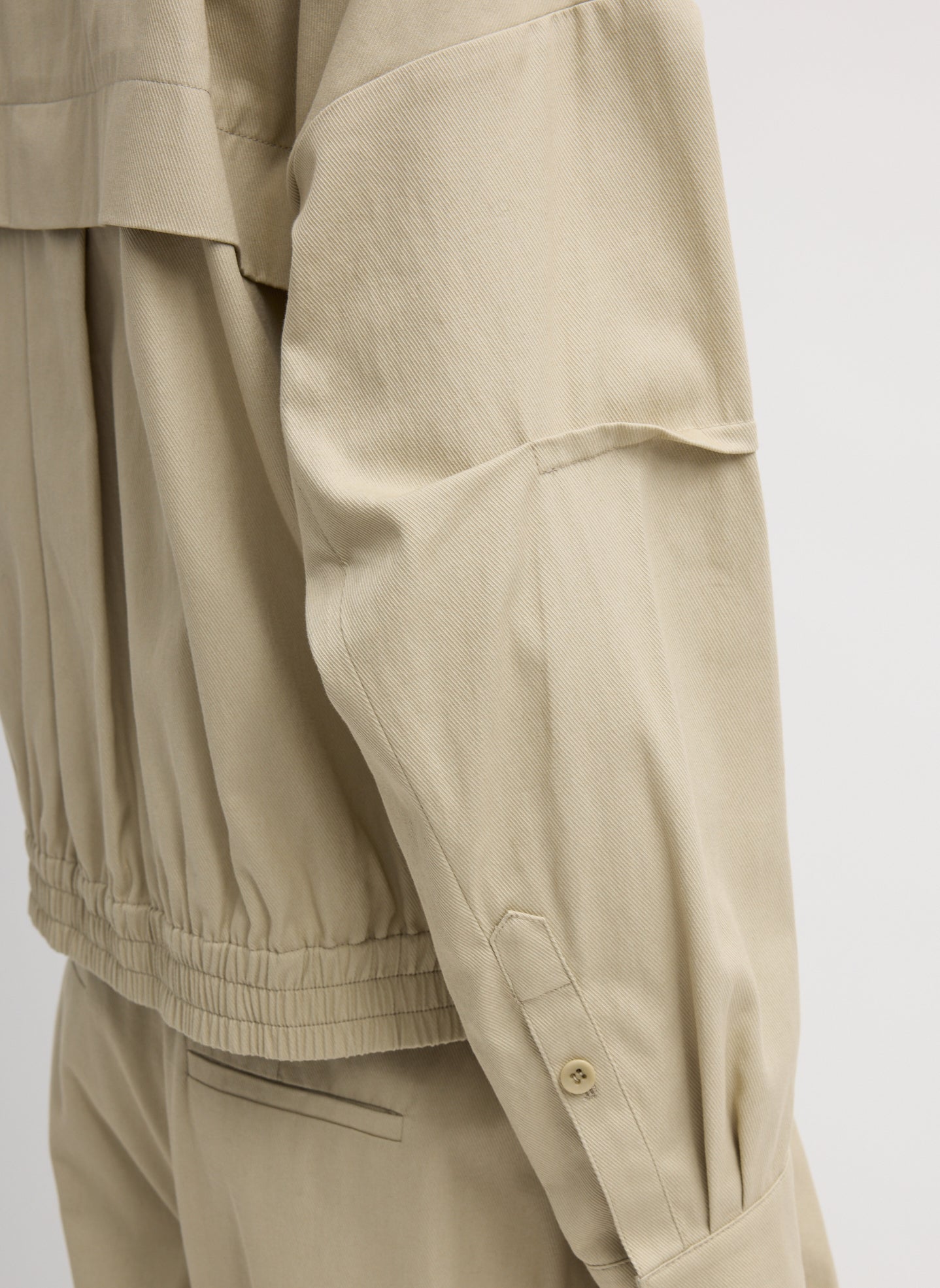 Taupe Luxe Spring Twill Bomber Jacket - closeup of sleeve detail