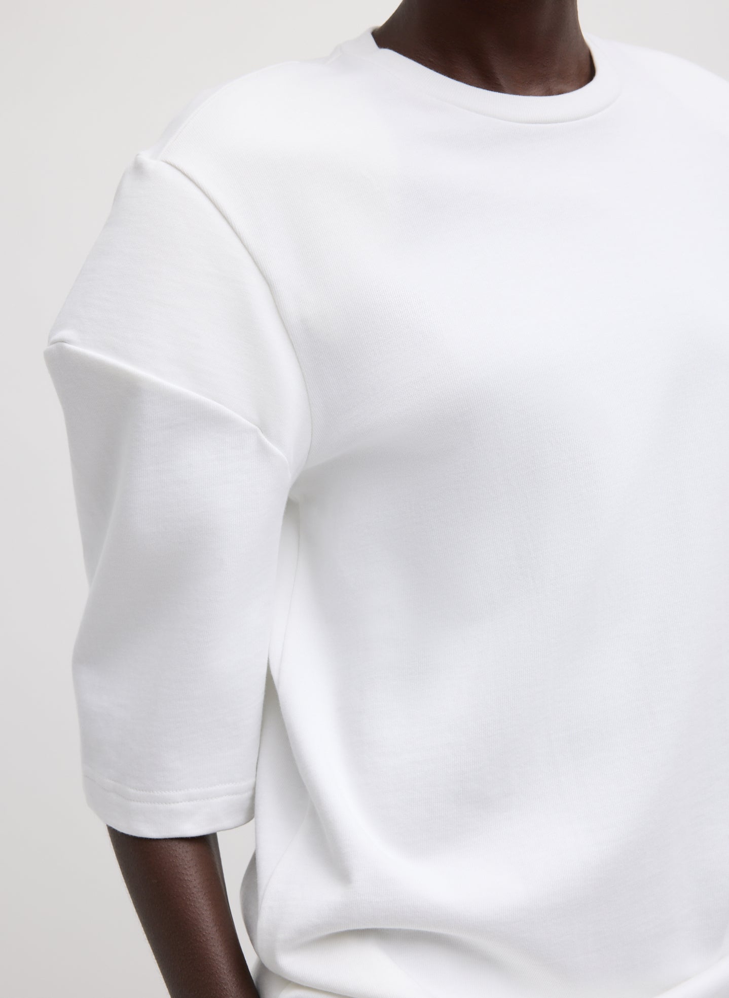 White Perfect Hinged Sleeve T-Shirt - closeup of hinged sleeve detail