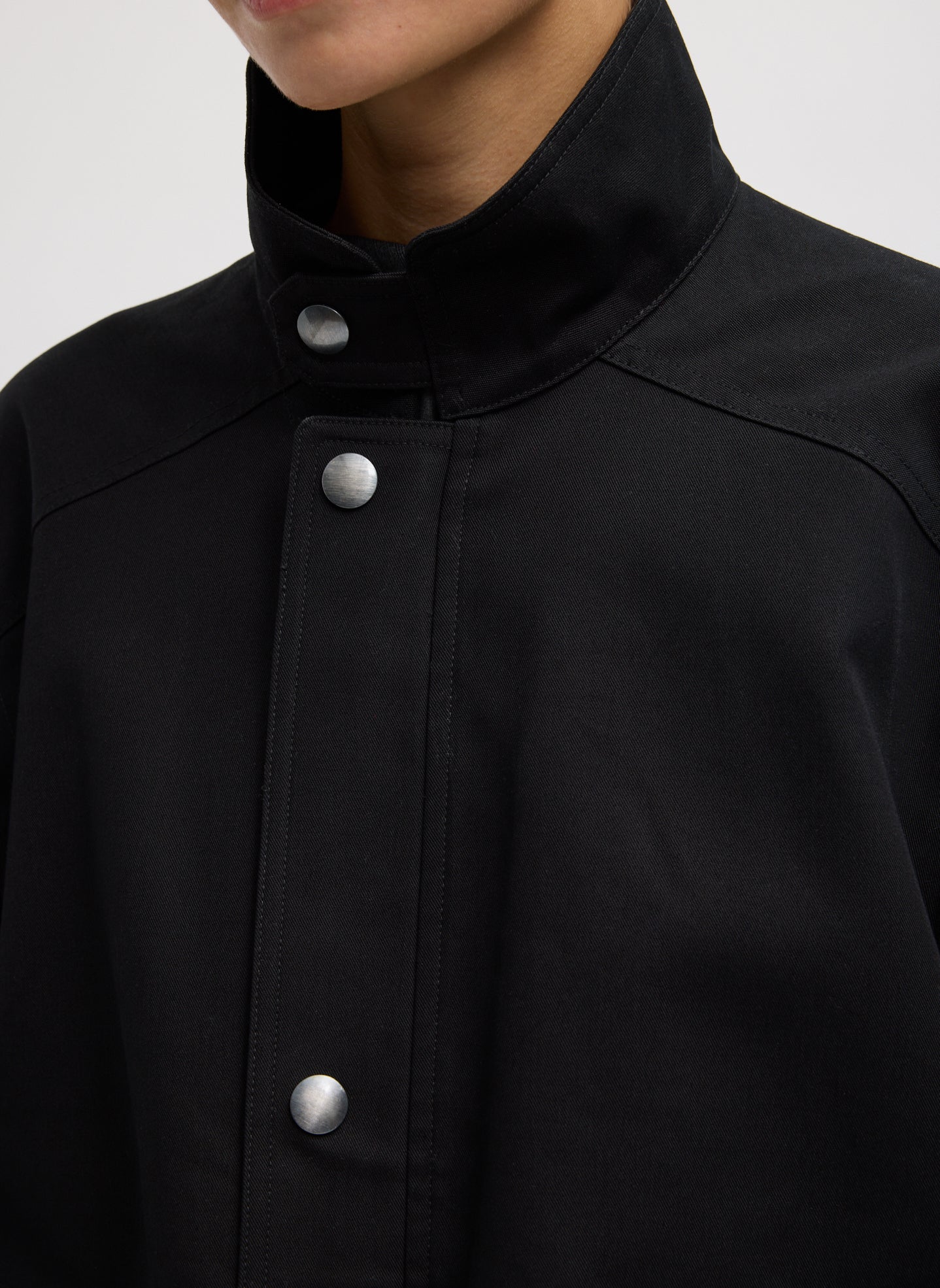 Black Patchwork Twill Bomber Jacket - closeup of neck