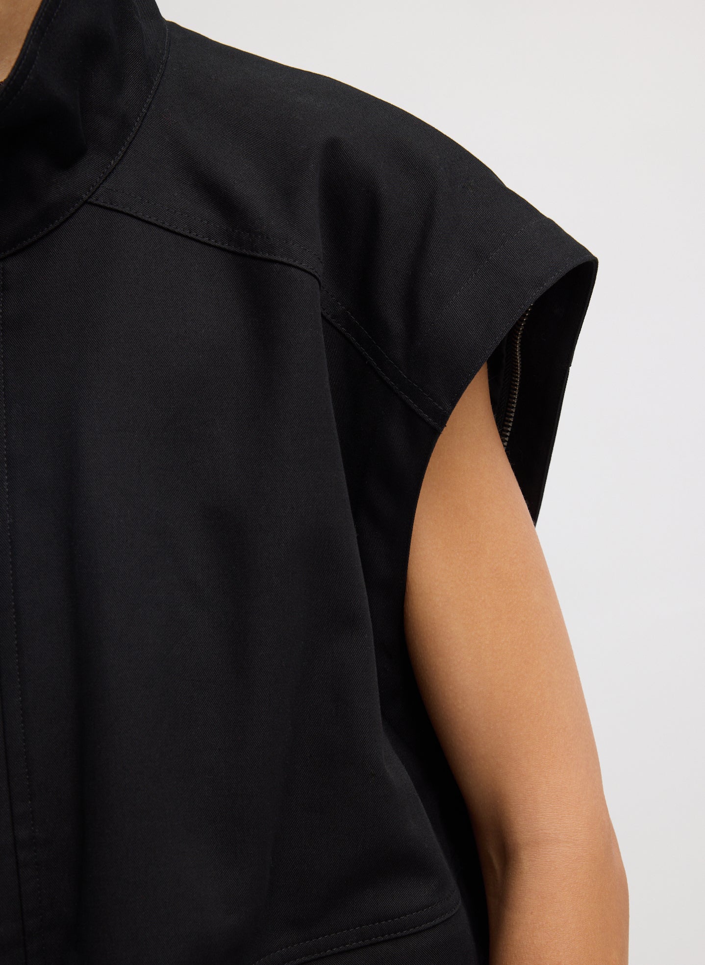 Black Patchwork Twill Bomber Jacket - closeup of removeable zip sleeve detail