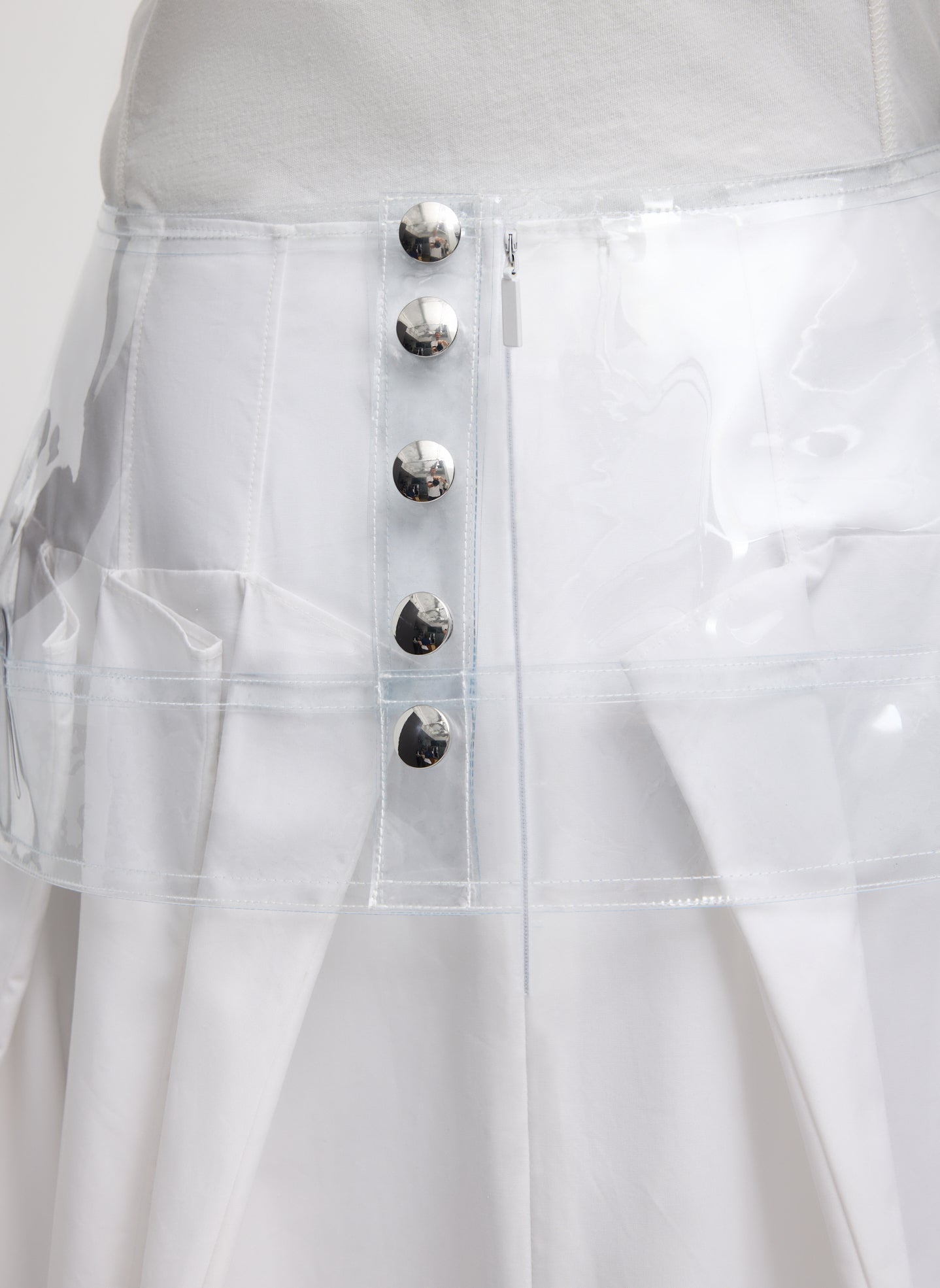 Clear Peplum Belt - closeup of button details at back