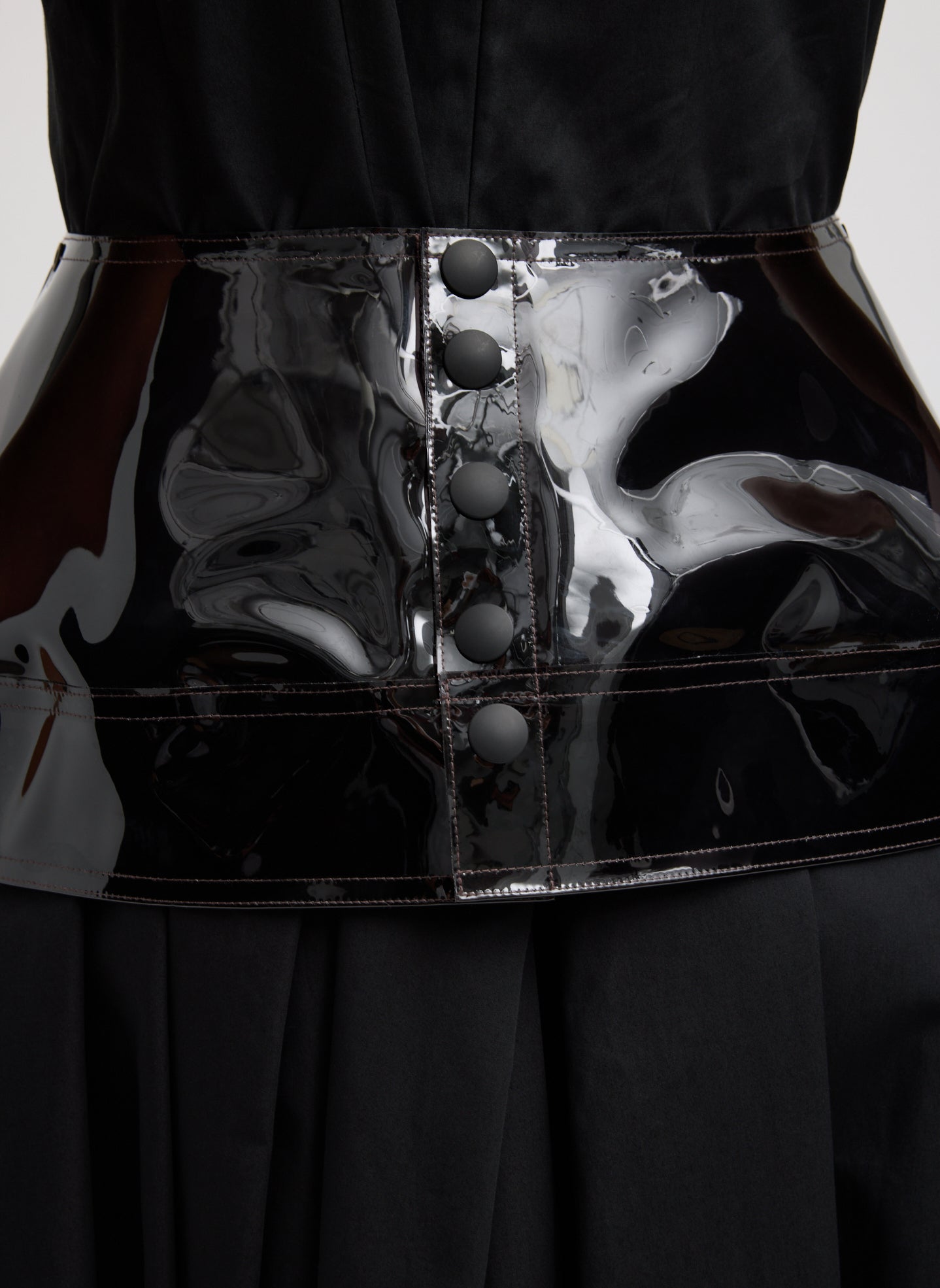 Sheer Black Peplum Belt - closeup of button details at back