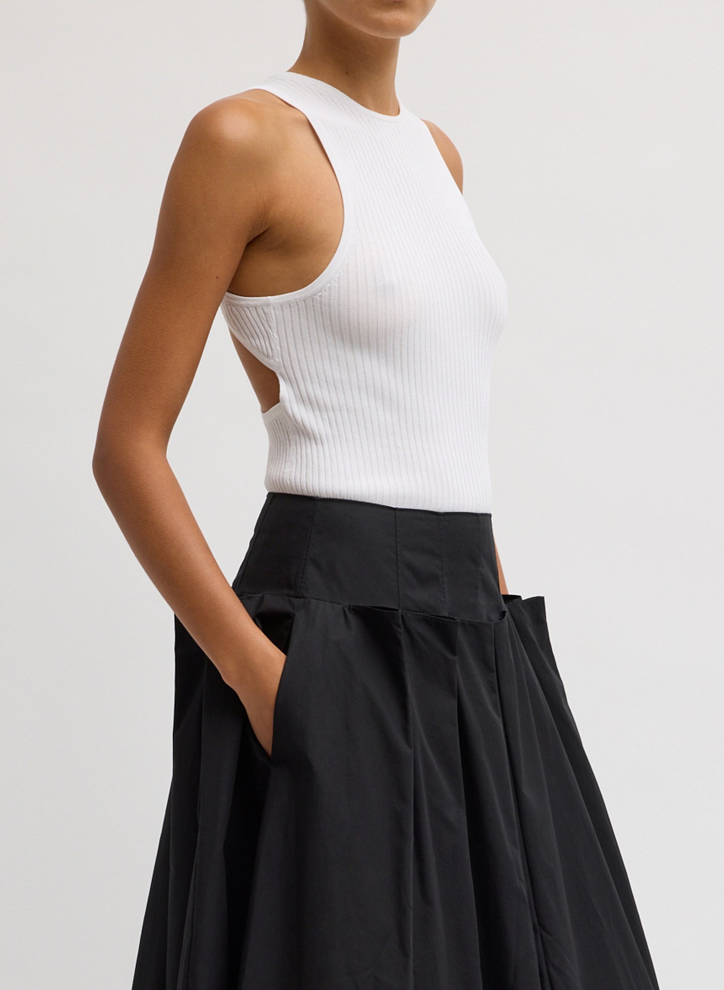 White Ribbed Sweater Cut Out Tank - side view on model