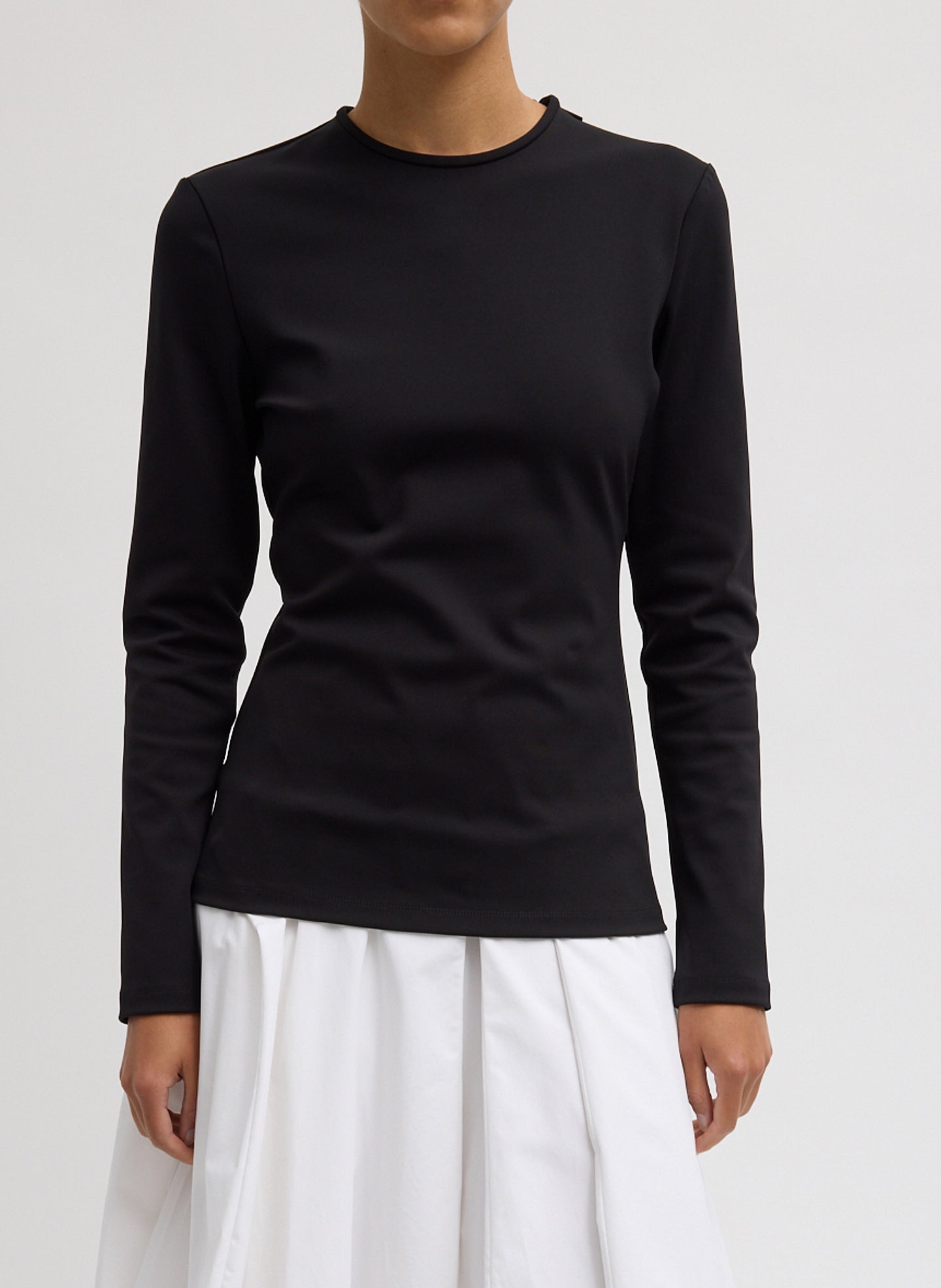 Black Compact Ultra Stretch Cut Out Back Top - long sleeve, front view on model