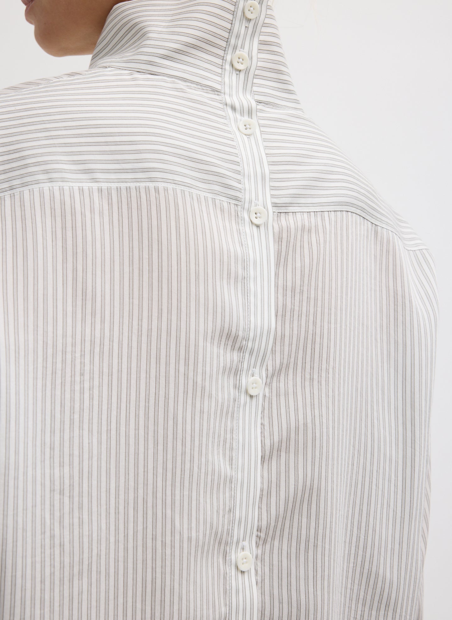 Ultra Light Silk Tencel Striped Funnel Neck Shirt - closeup of buttons at back