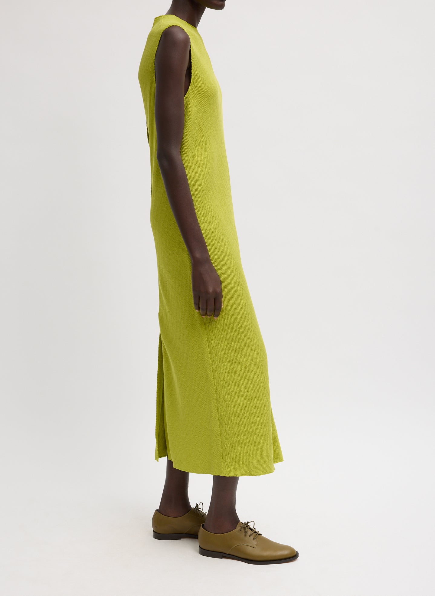 Chartreuse Viscose Plisse Sleeveless Bias Dress - side view on model