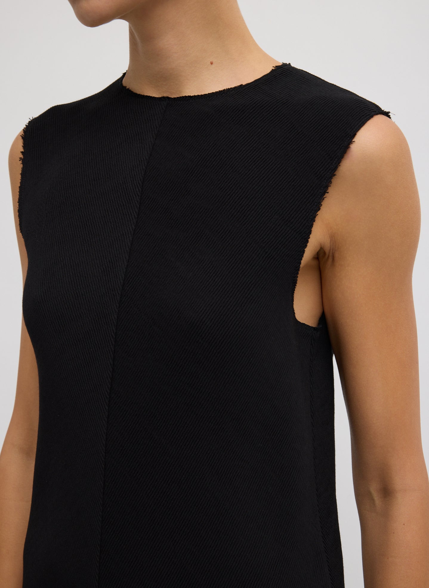 Black Viscose Plisse Sleeveless Bias Short Tunic - closeup of neckline