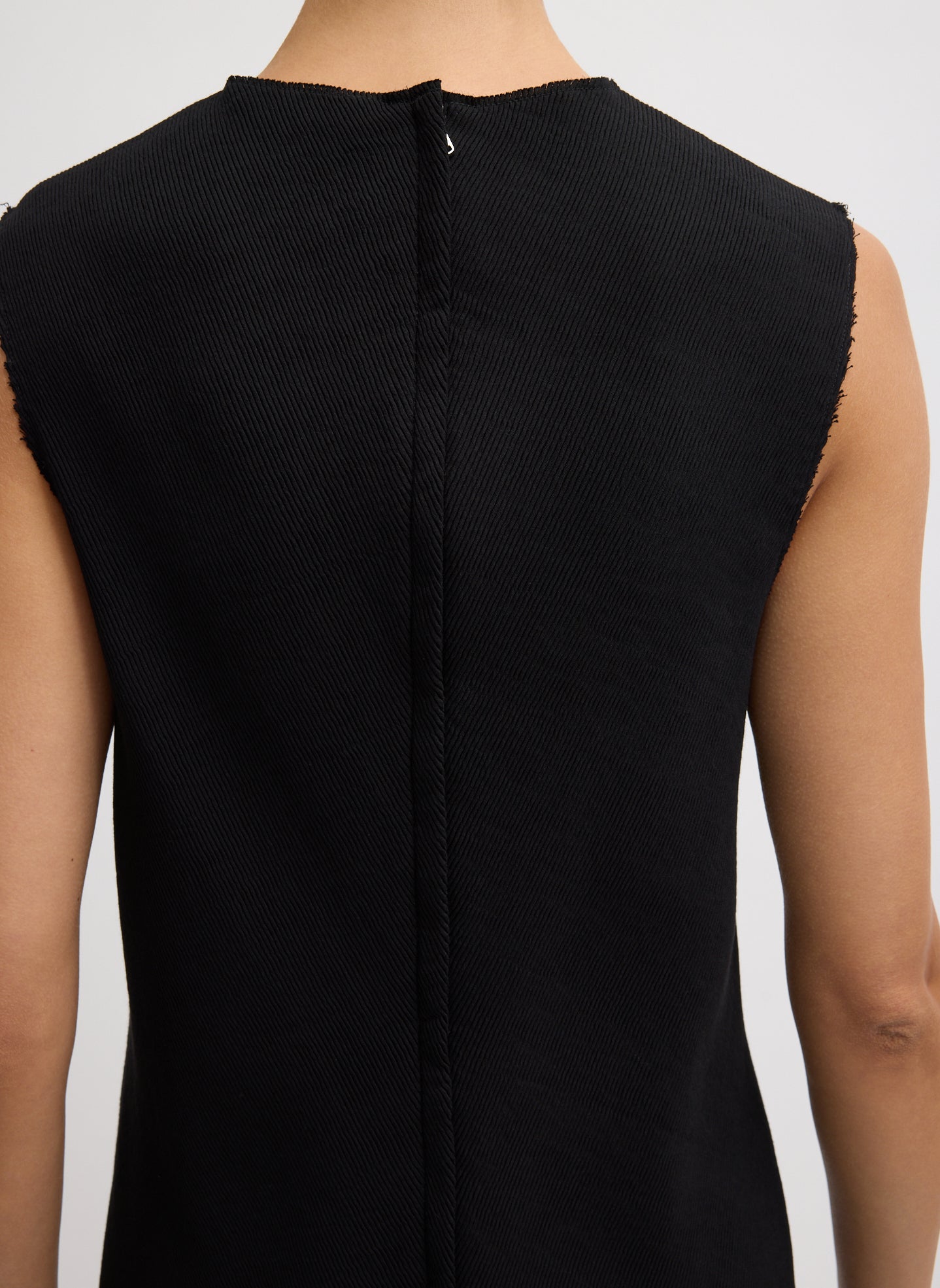 Black Viscose Plisse Sleeveless Bias Short Tunic - closeup of back