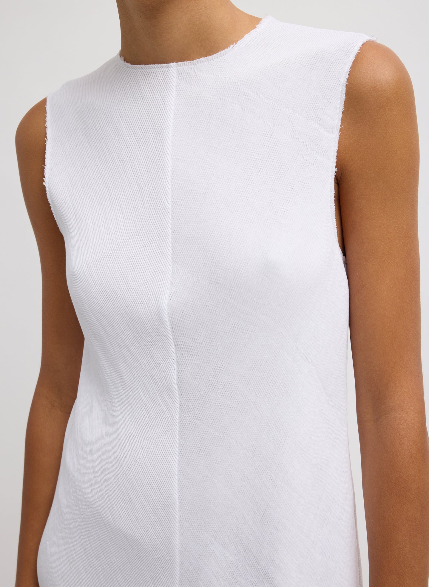 White Viscose Plisse Sleeveless Bias Short Tunic - closeup of neckline