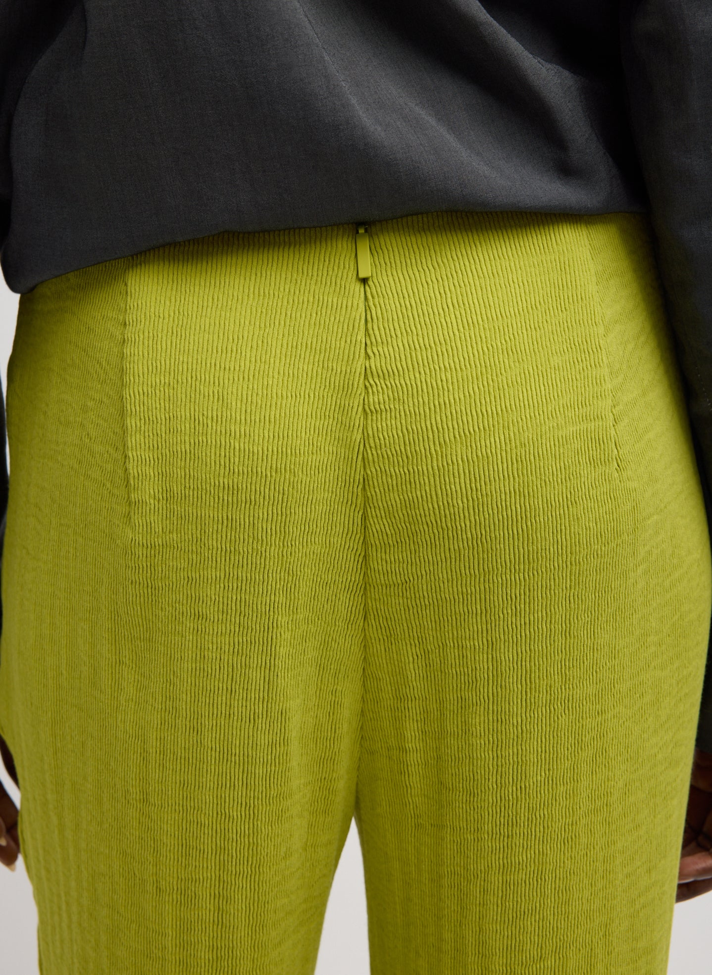Chartreuse Viscose Plisse Corbit Pant - closeup of back zip detail