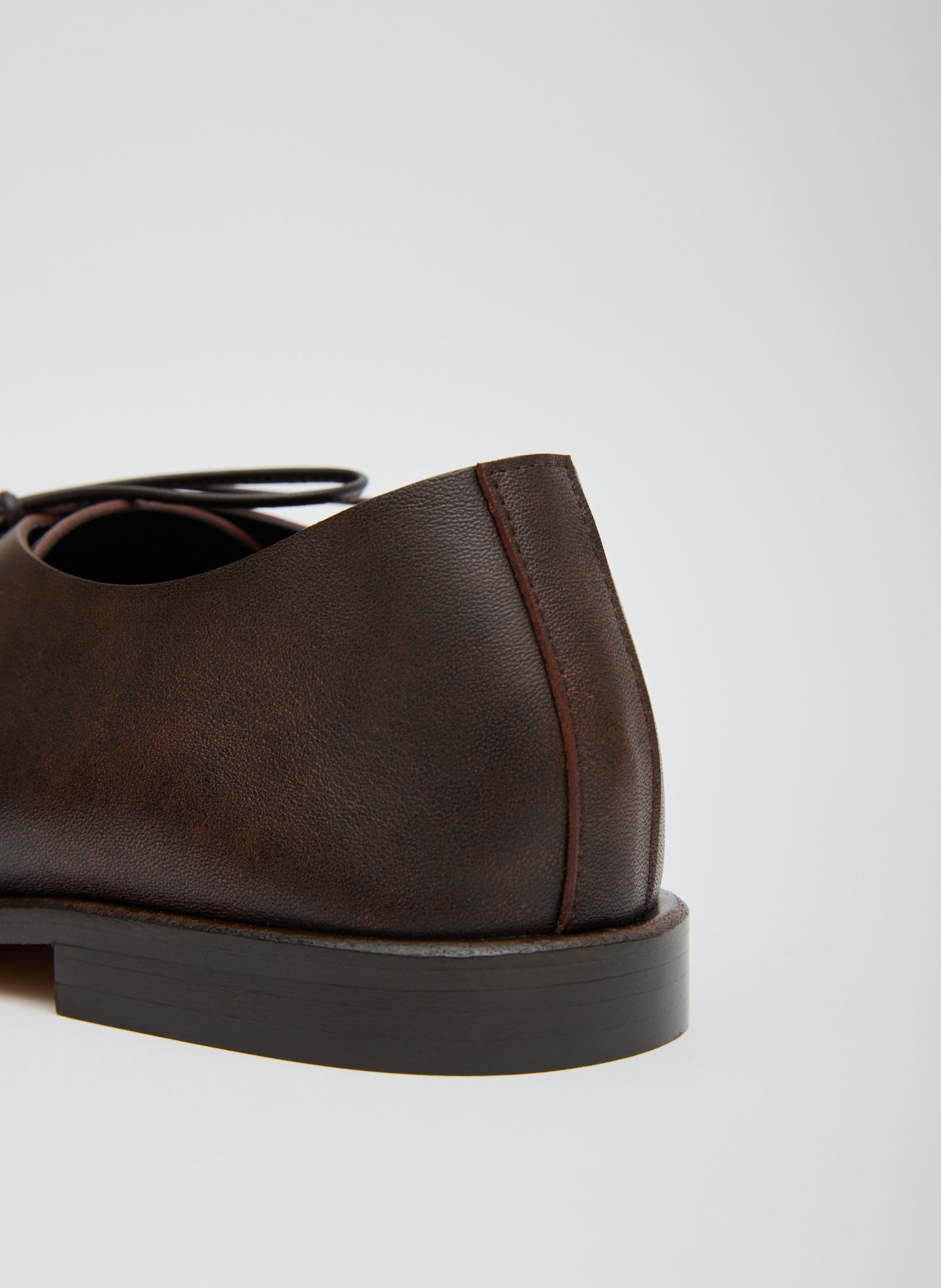 Brown Brody Square Toe Loafer - closeup of leather material