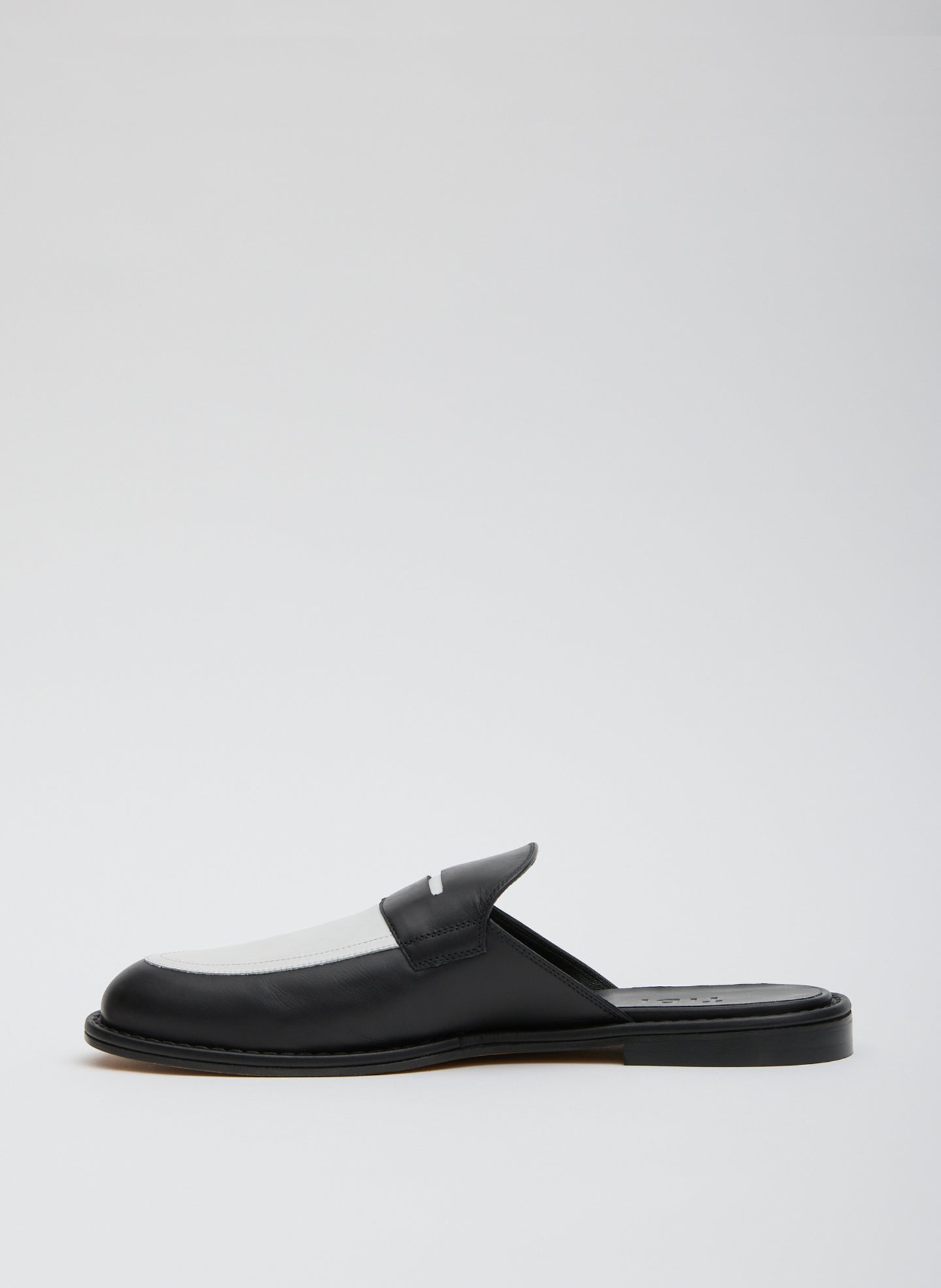 Black and White Herbert Slide - two-tone loafer slides, side view