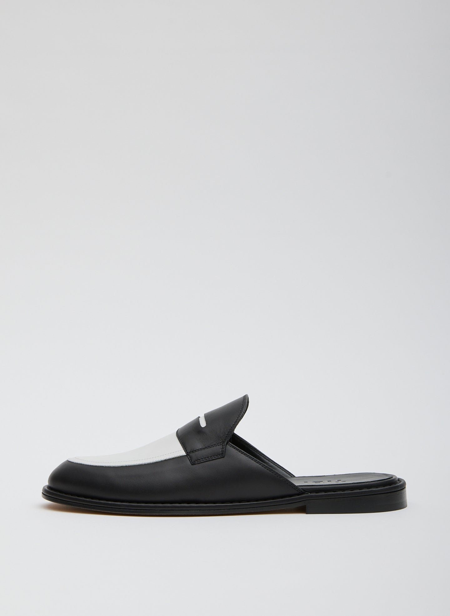 Black and White Herbert Slide - two-tone loafer slides, side view