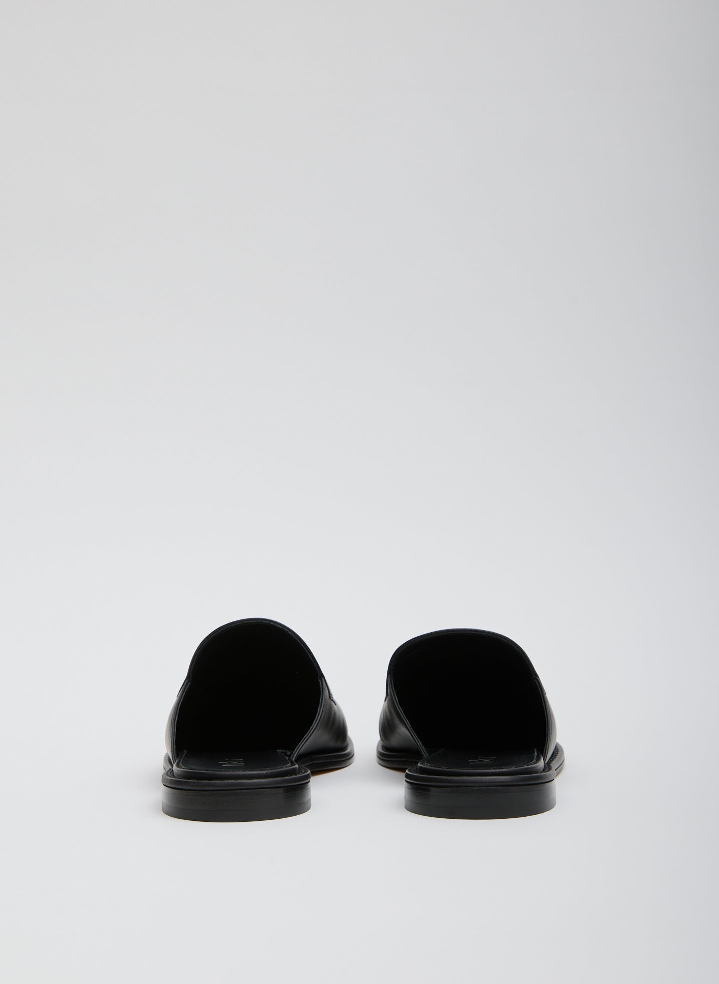 Black and White Herbert Slide - two-tone loafer slides, back view