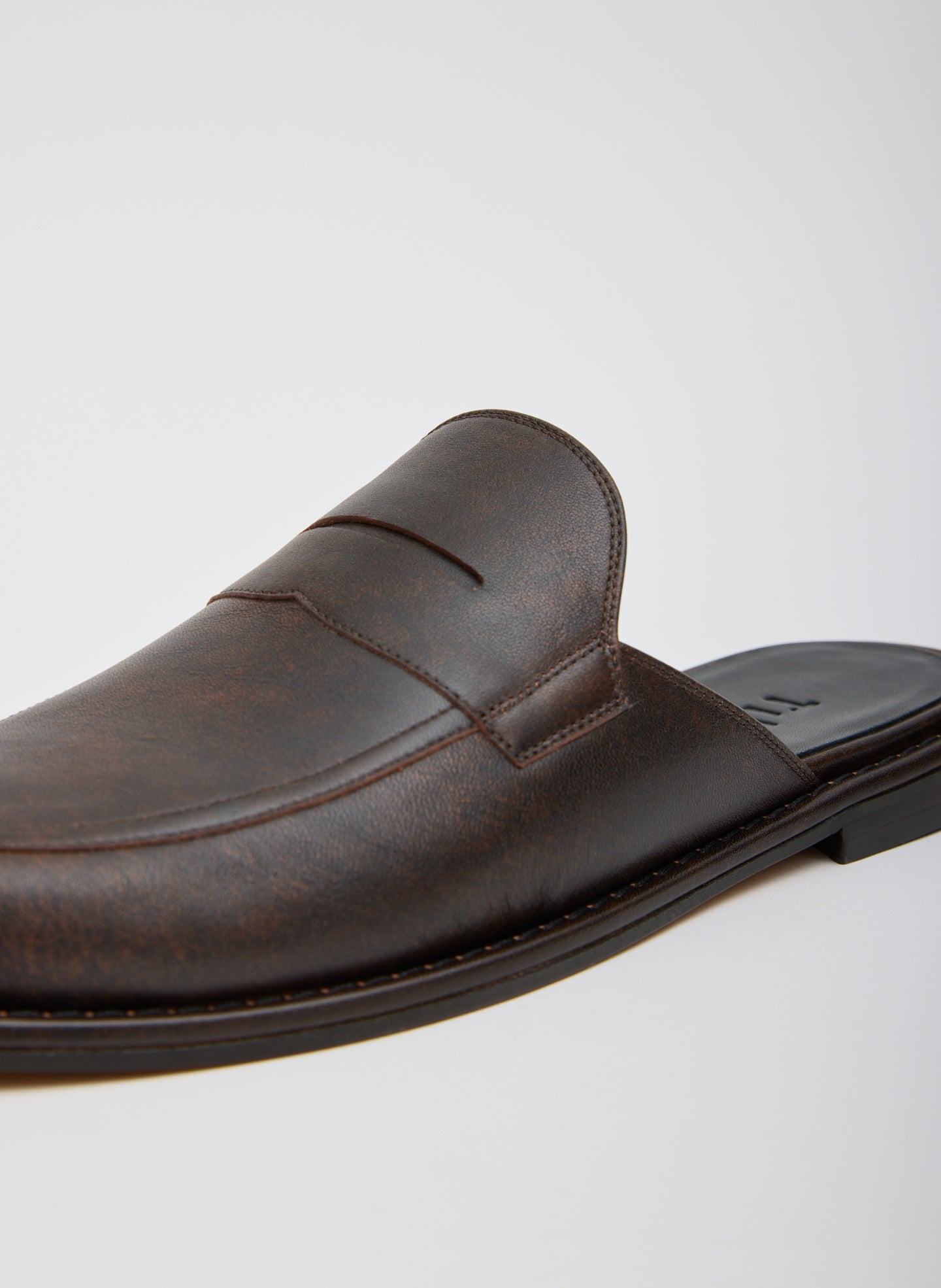 Brown Leather Herbert Slide - closeup of leather