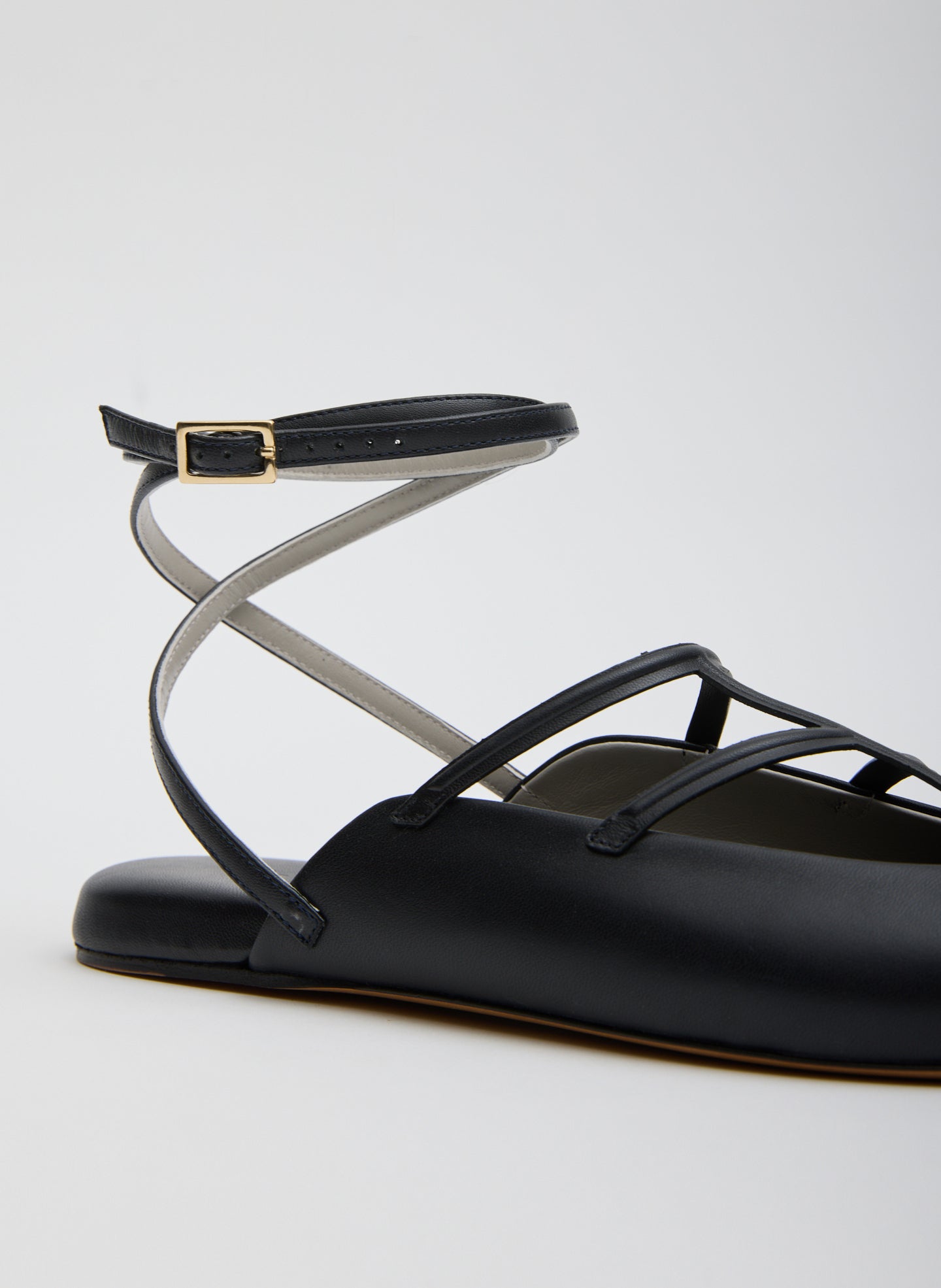 Dark Navy Jean-Claude Flat - closeup of ankle strap