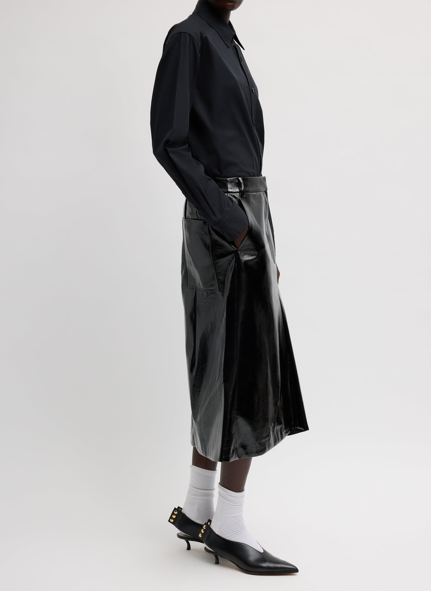 Black Faux Patent Leather Sculpted Silke Skirt - full look, side view on model
