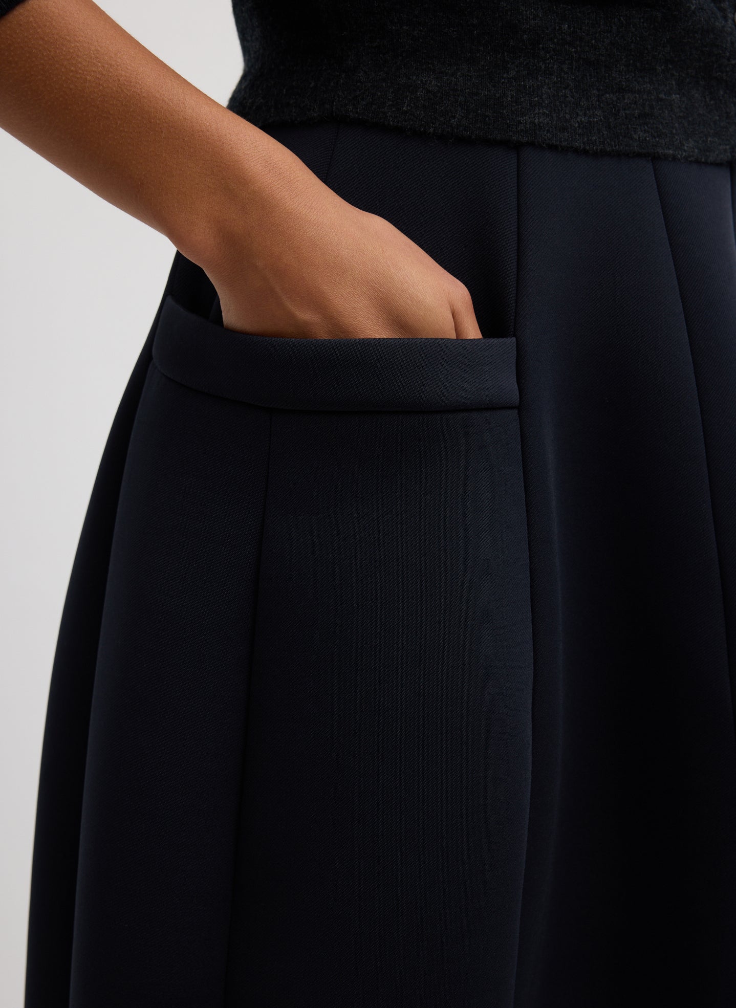 Navy Bonded Twill Sculpted Skirt With Removable Beading - closeup of side pocket with beading removed