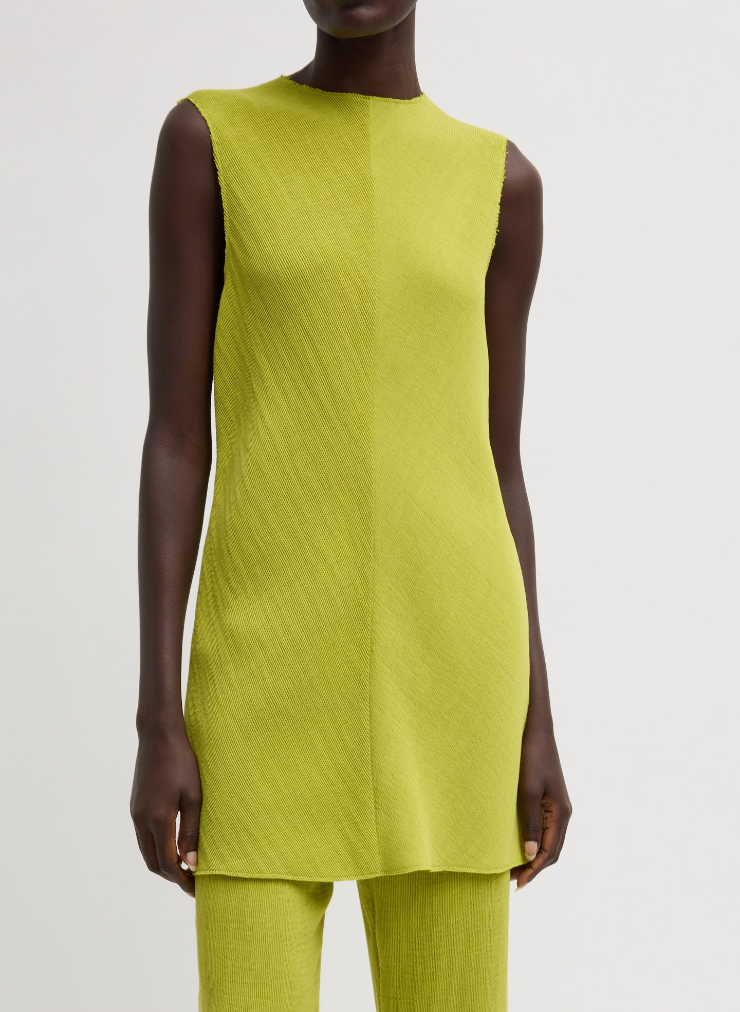 Chartreuse Viscose Plisse Sleeveless Bias Short Tunic - front view on model