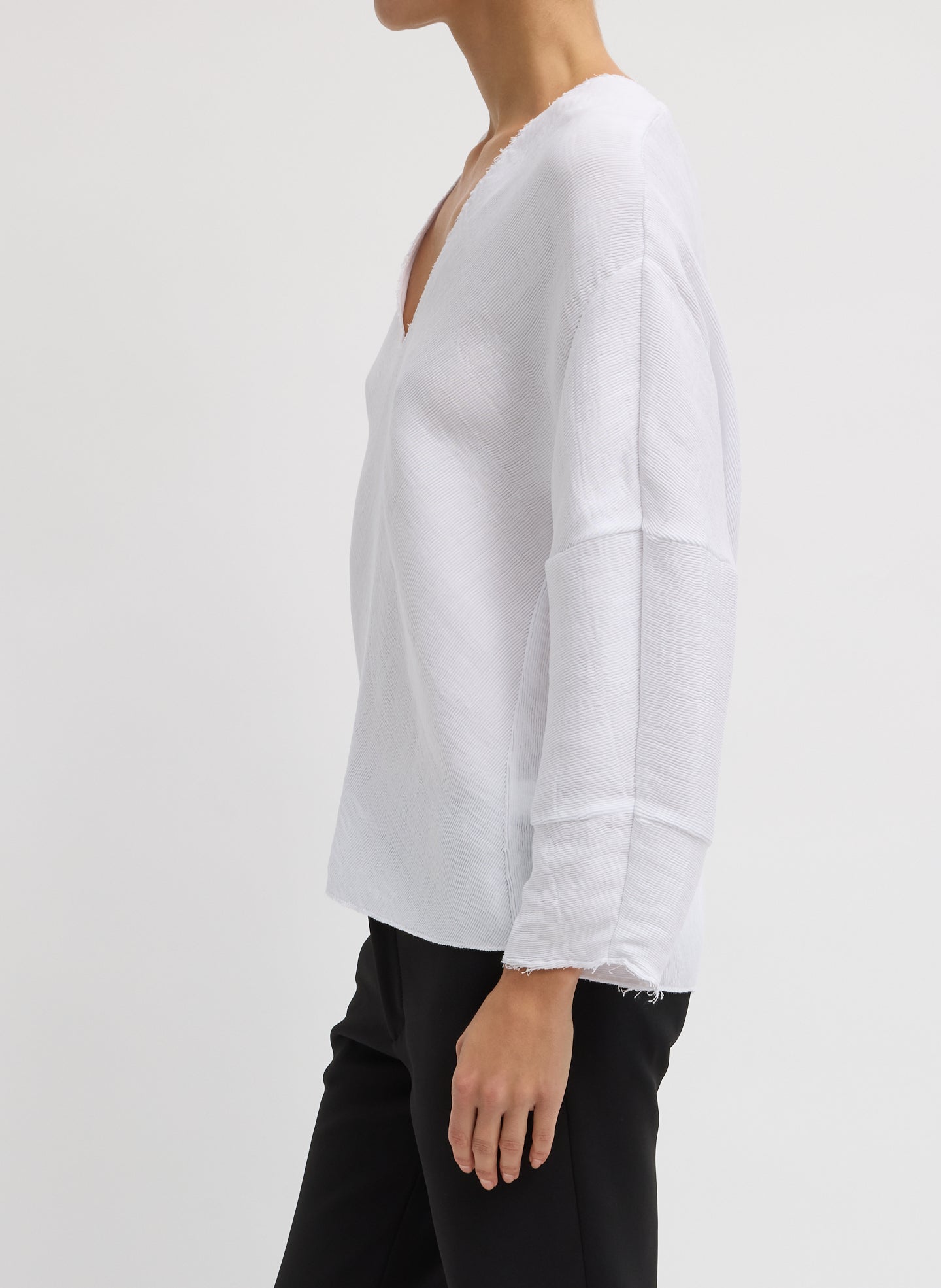 White Viscose Plisse Hinged Long Sleeve Top - side view on model