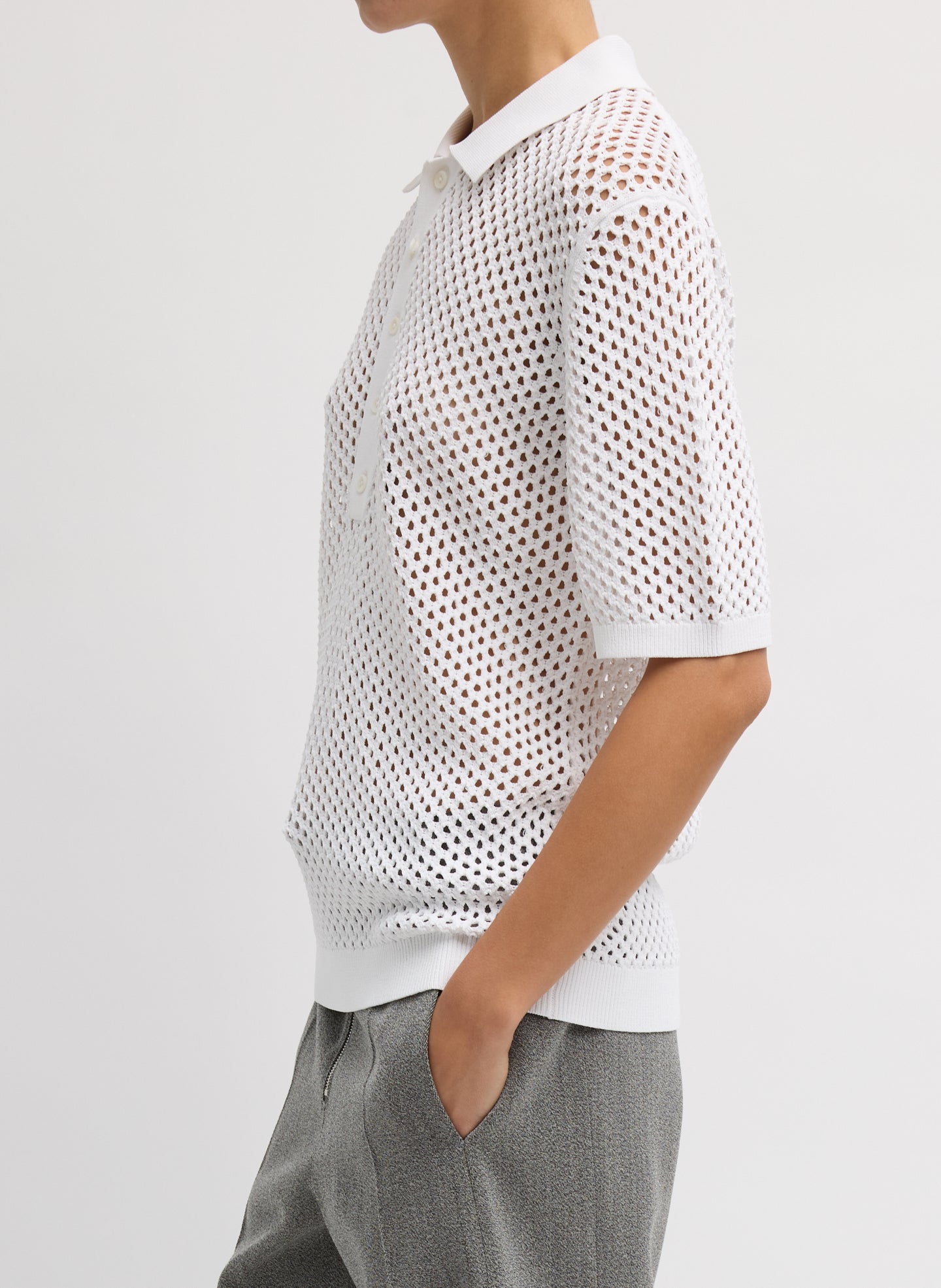 White Crochet Netting Slim Polo - short sleeve crochet polo, side view on model
