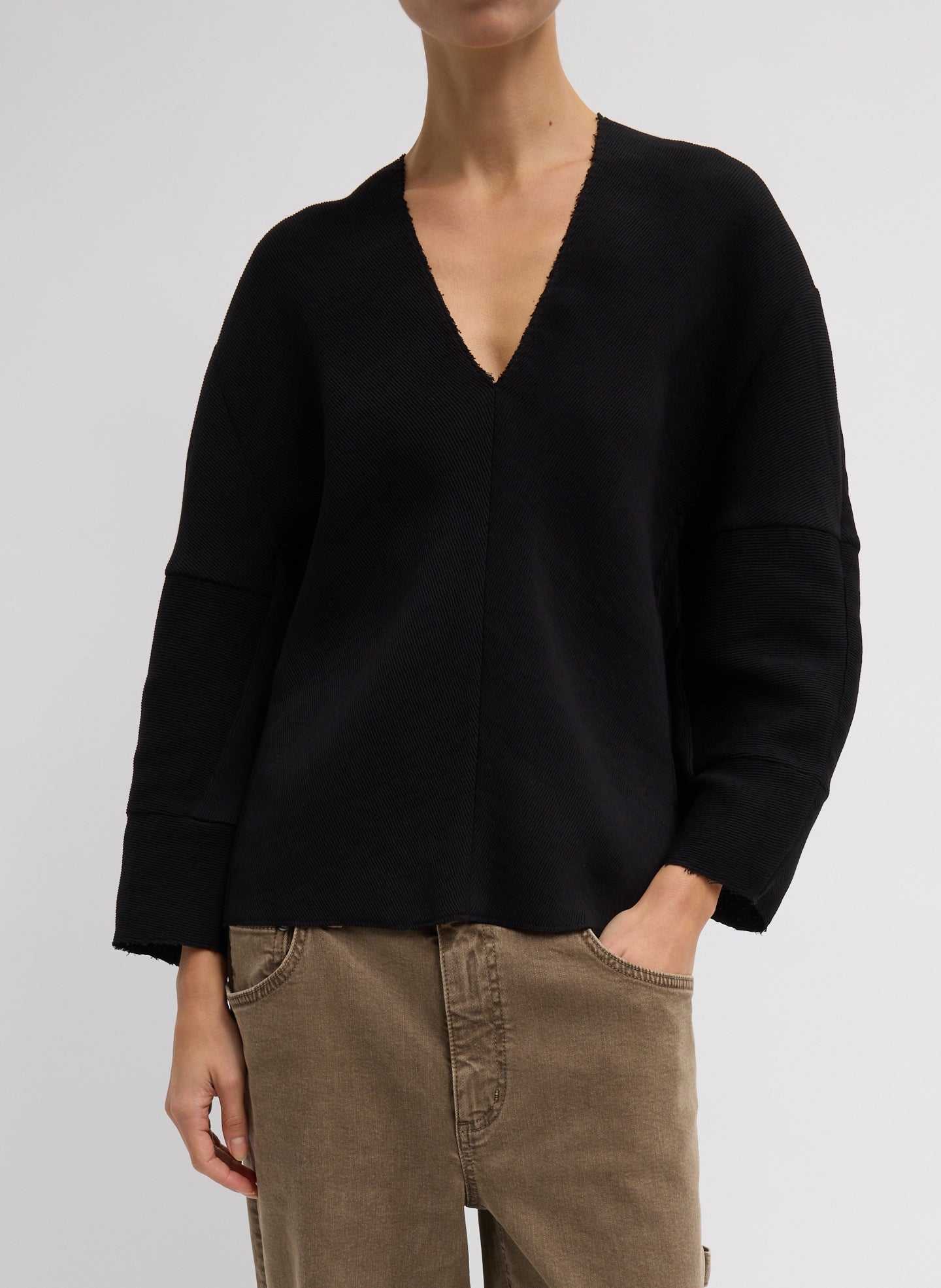 Black Viscose Plisse Hinged Long Sleeve Top - front view on model