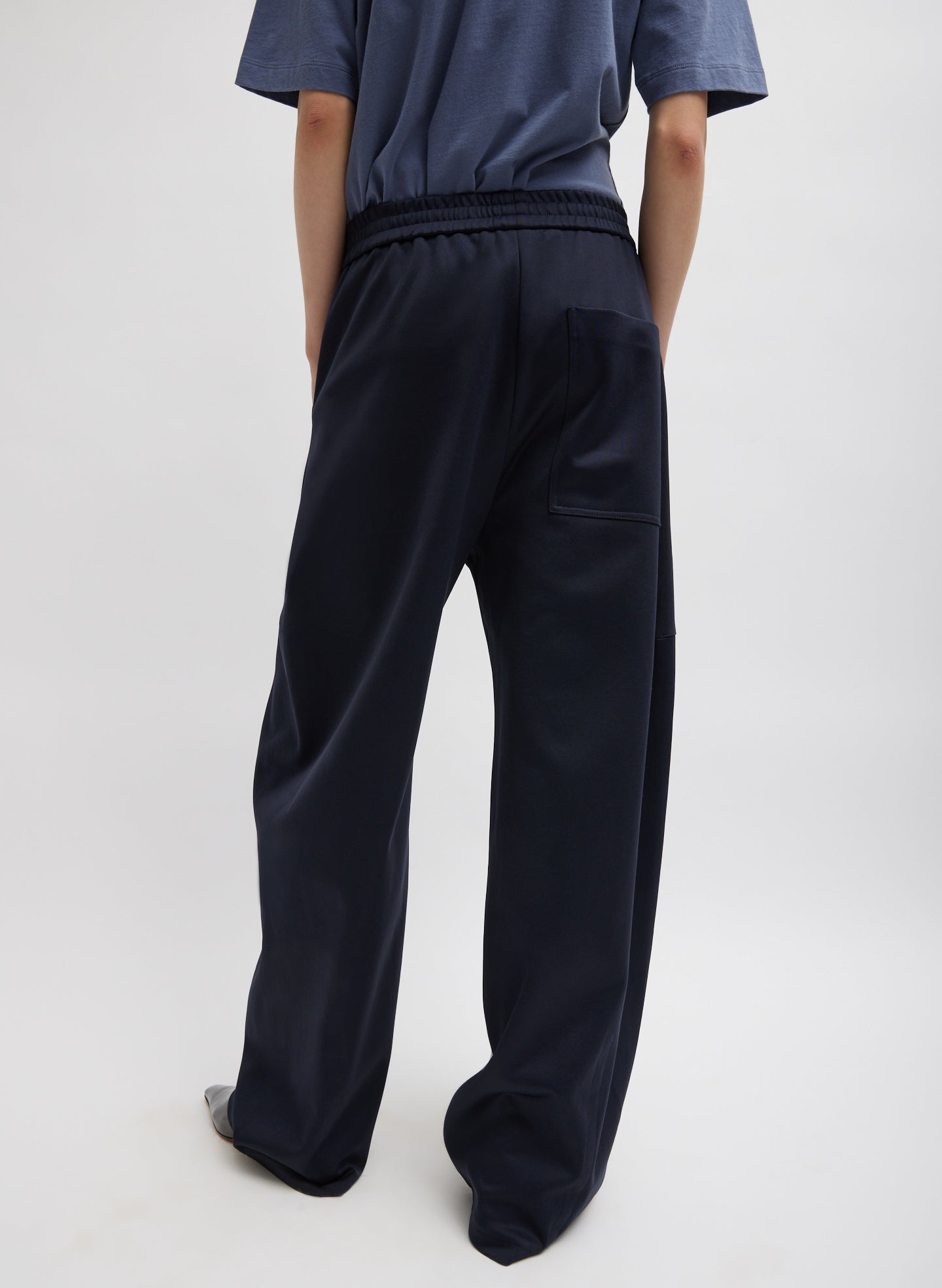 Navy Active Knit Winslow Pant - barrel leg, lounge pant, back view on model