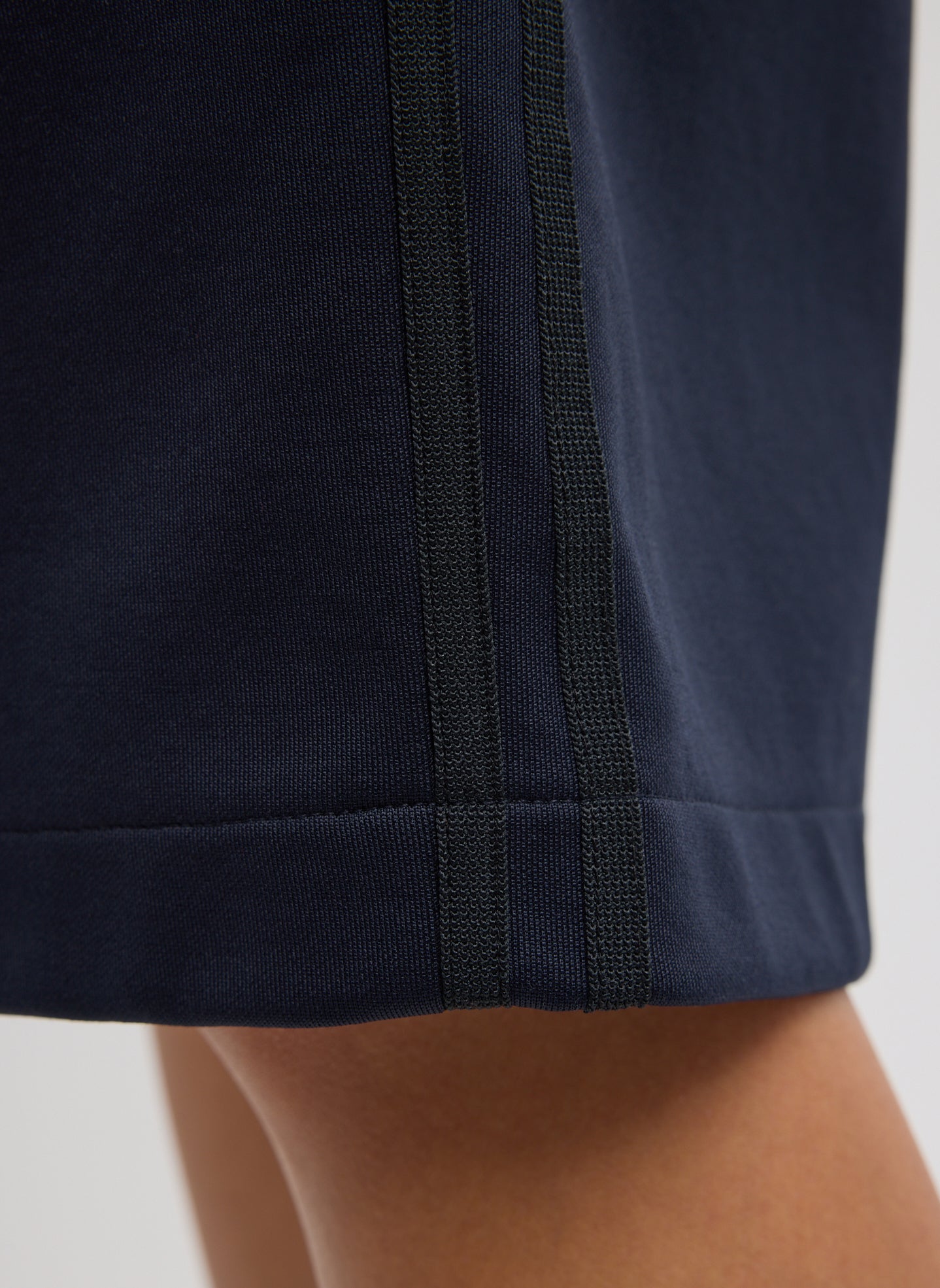 Navy Active Knit Short - closeup of tonal side stripe detail