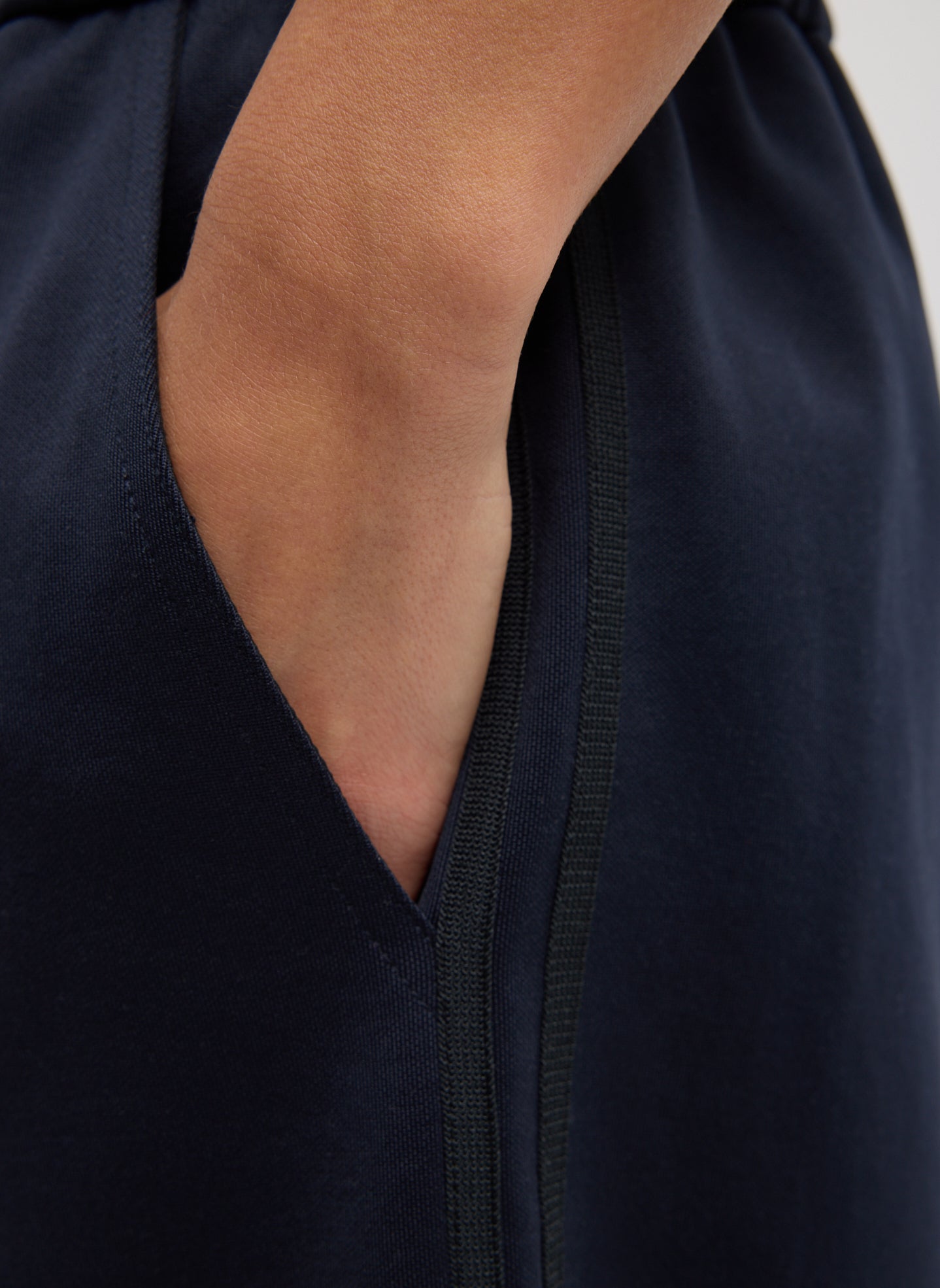 Navy Active Knit Short - closeup of side pocket detail