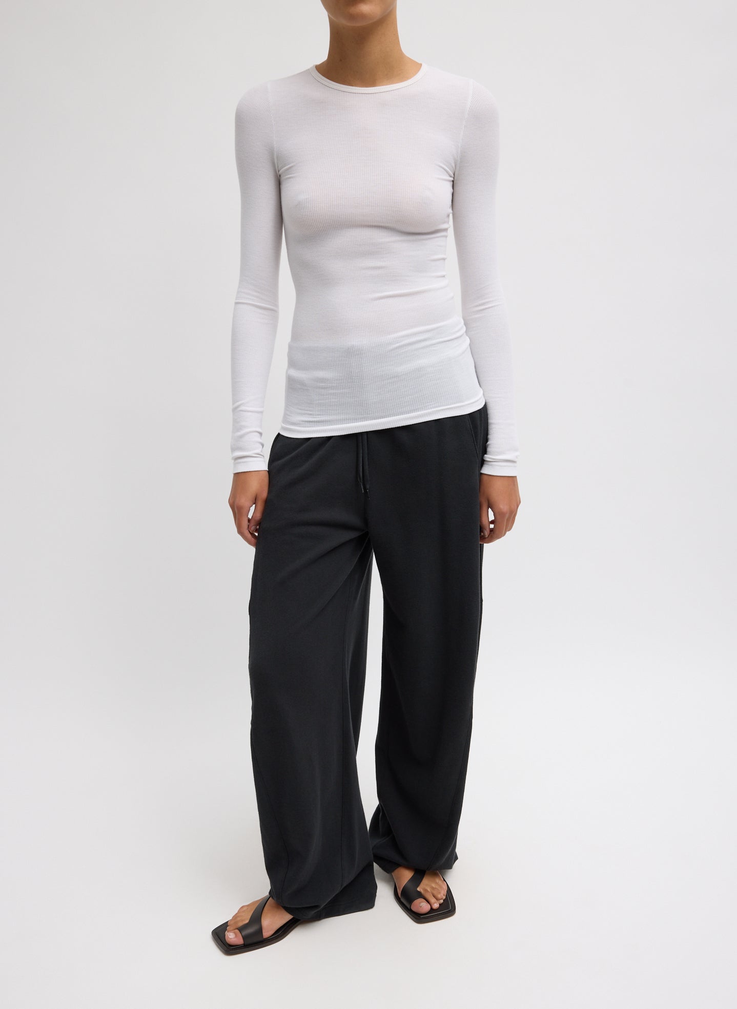 White Circular Ribbed Crewneck Pullover T-Shirt - full look, front view on model