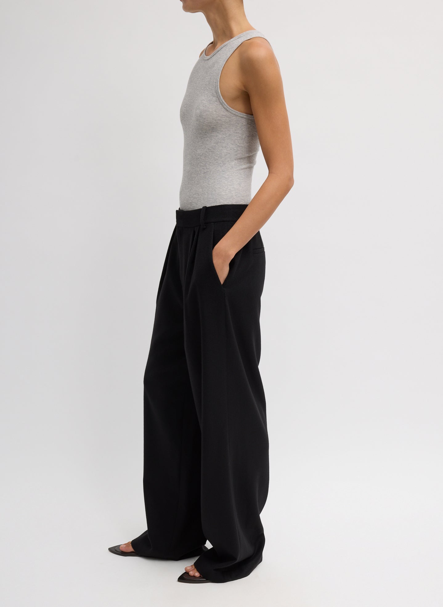 Black Cashmere Suiting Stella Pant - pleated trouser, side view on model