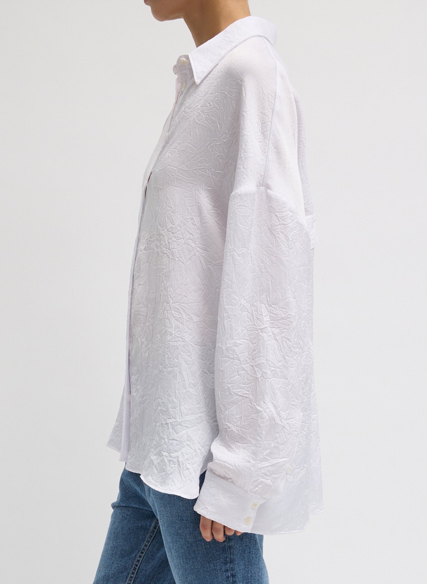 White Oversized Crinkled Button Down - button down shirt, side view on model