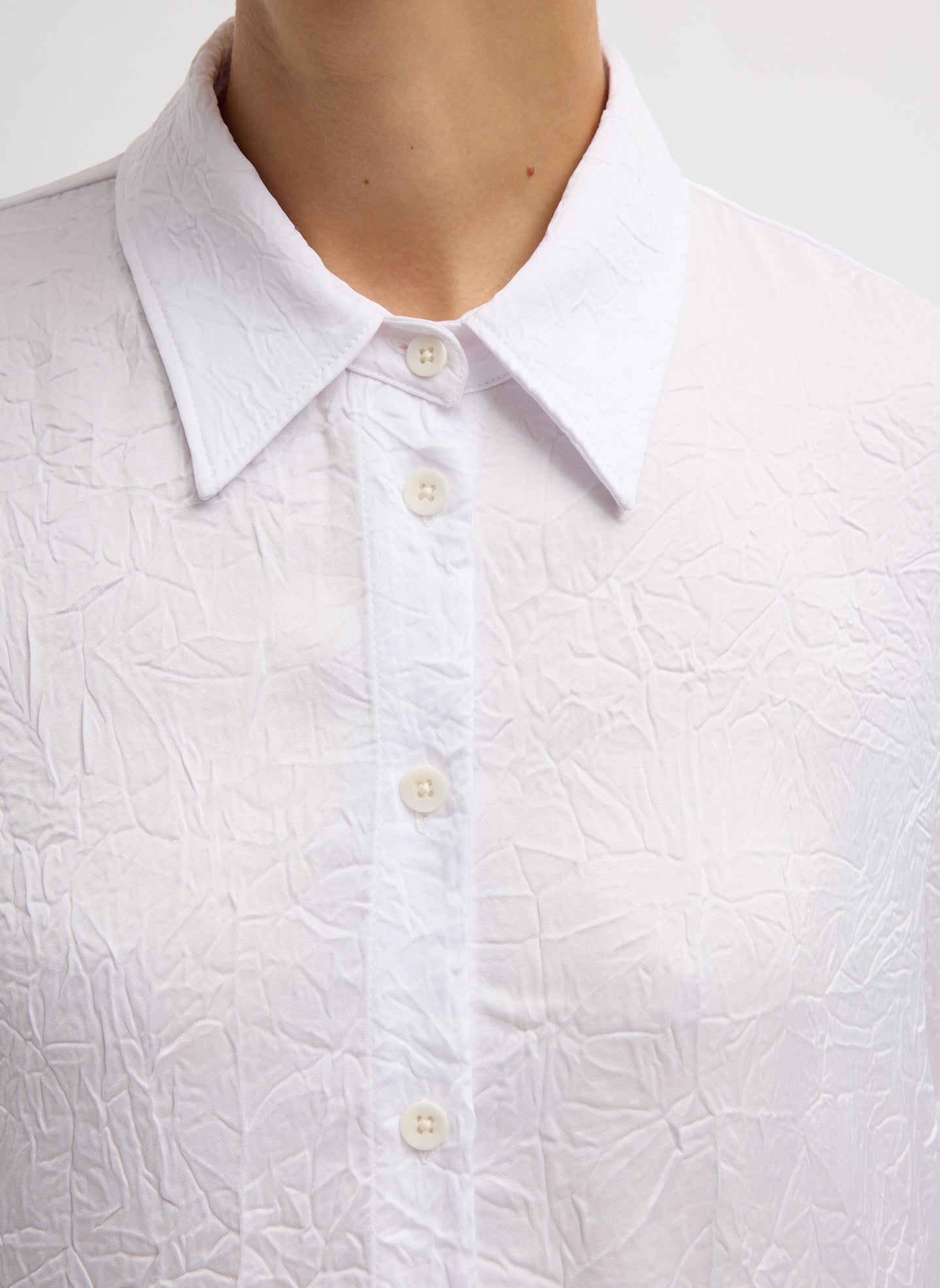 White Oversized Crinkled Button Down - close up of crinkled fabric