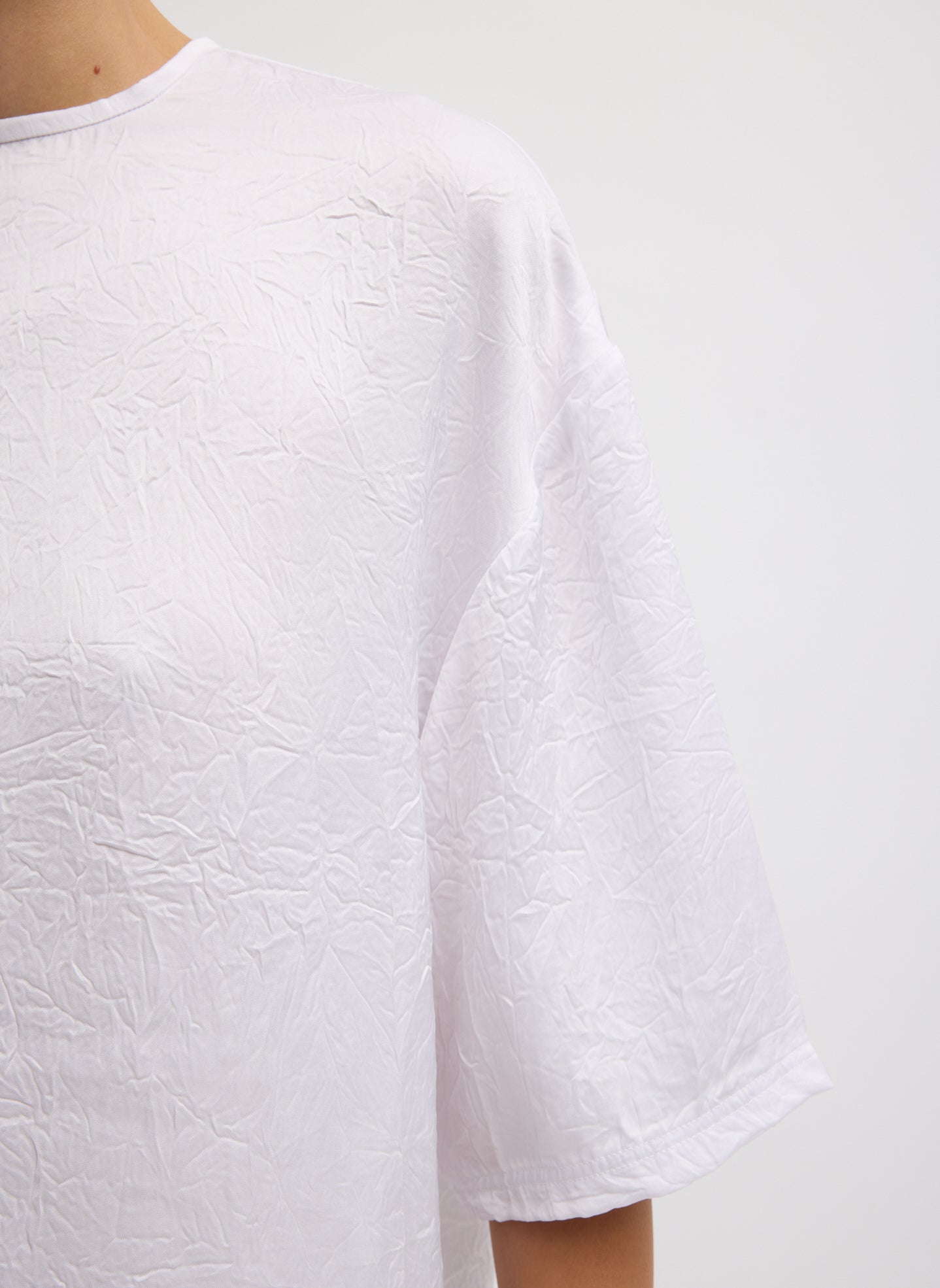 White Crinkle Shirting Easy T-Shirt - closeup of crinkled fabric