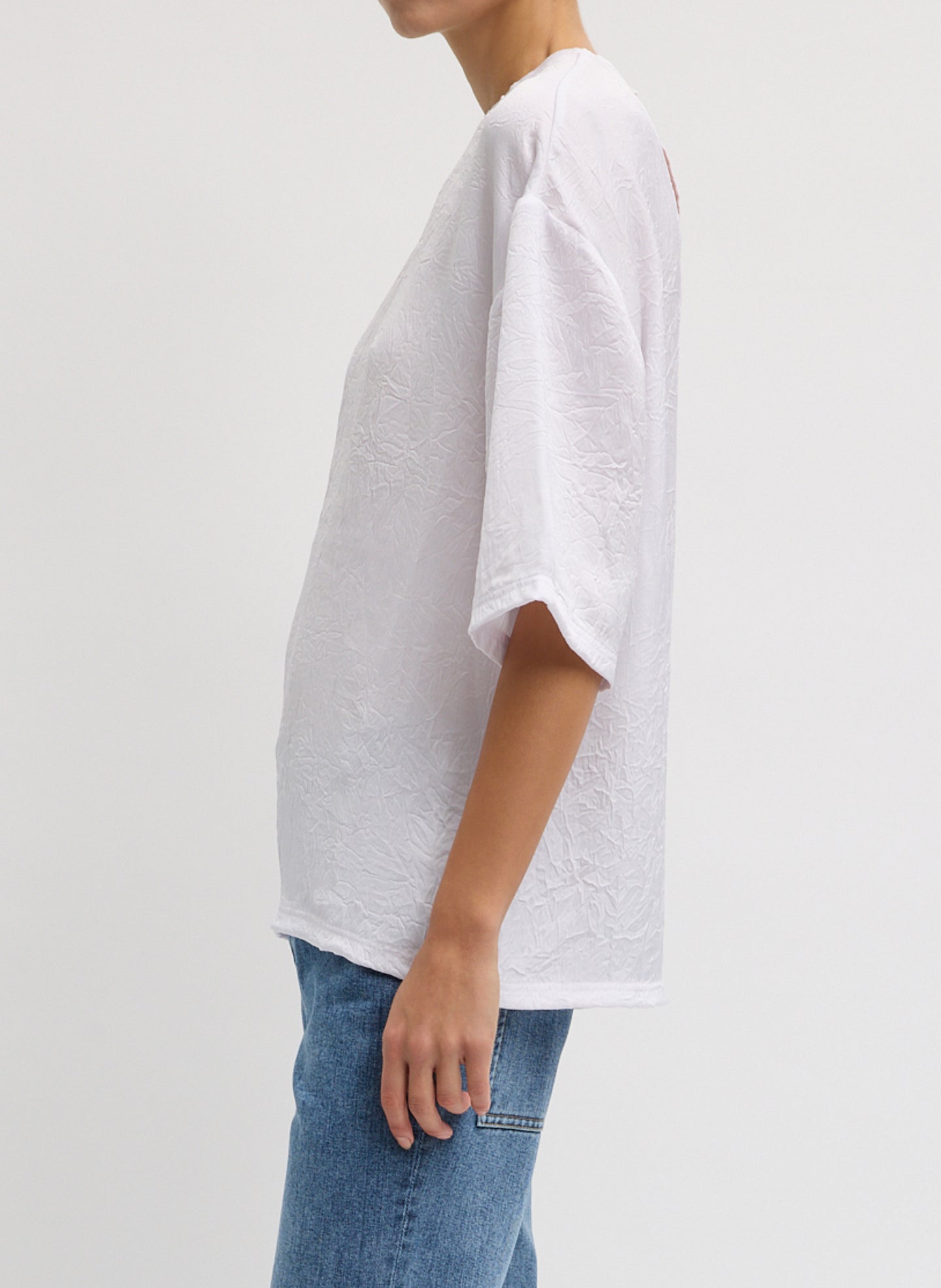 White Crinkle Shirting Easy T-Shirt - oversized silk t-shirt, side view on model