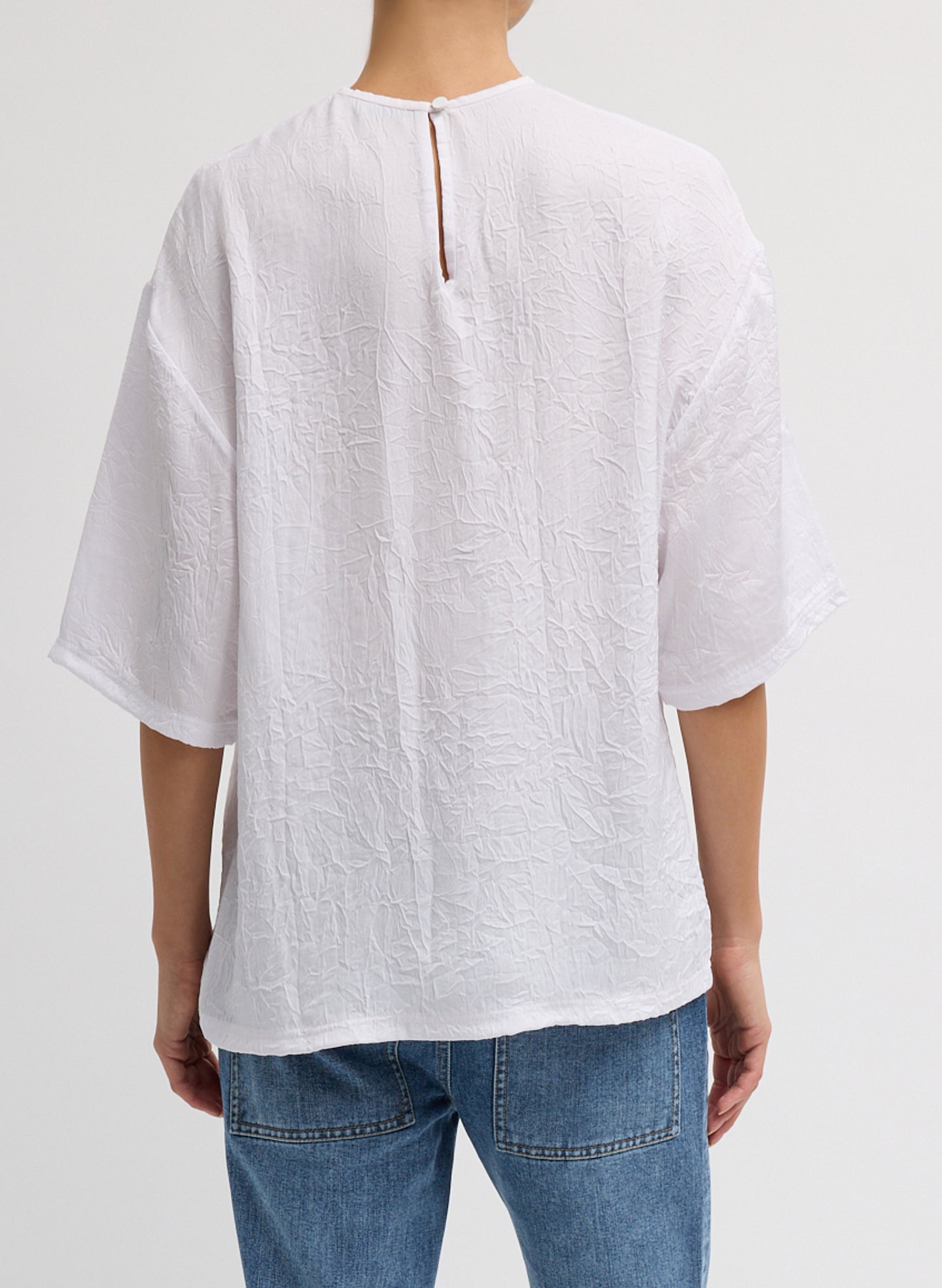 White Crinkle Shirting Easy T-Shirt - oversized silk t-shirt, back view on model