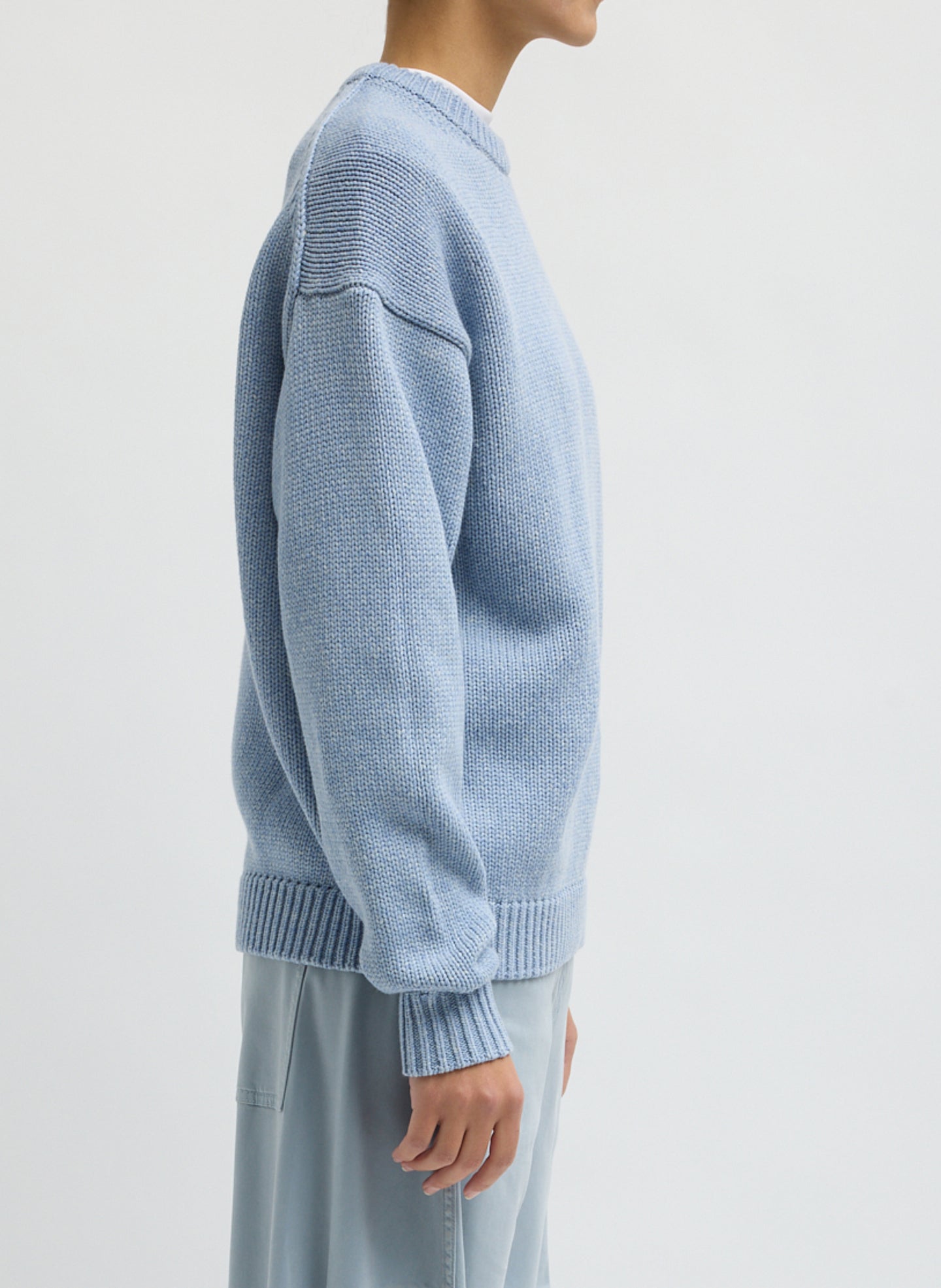 Light Blue Cotton Wool Crewneck Pullover - thick knit sweater, side view on model