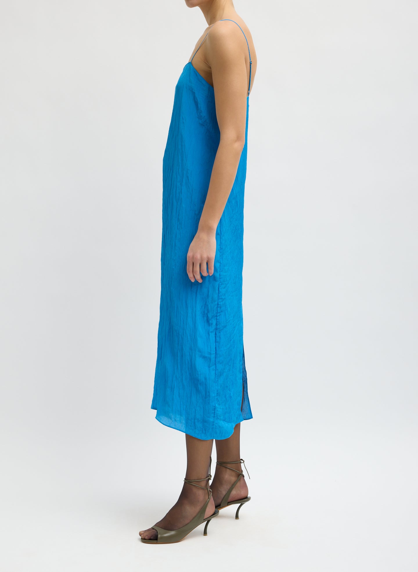 Bright Blue Crinkle Slip Dress - sleeveless midi dress, side view on model