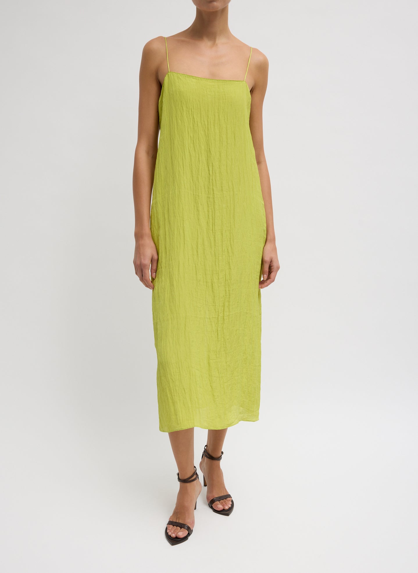 The Crinkle Slip Dress - Chartreuse Green Crinkle Slip Dress - silk midi dress, front view on model