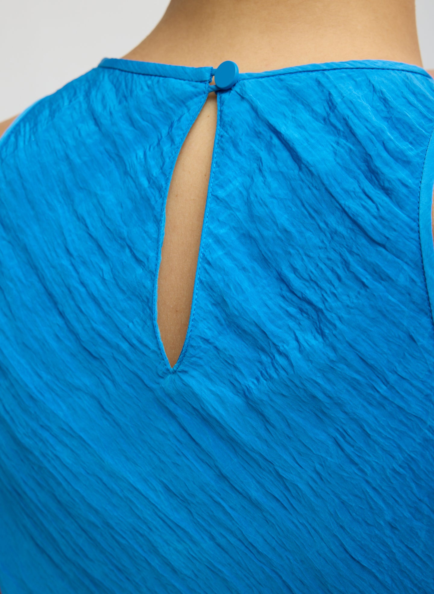 Bright Blue Crinkle Slip Midi Bias Dress - closeup of button closure at back