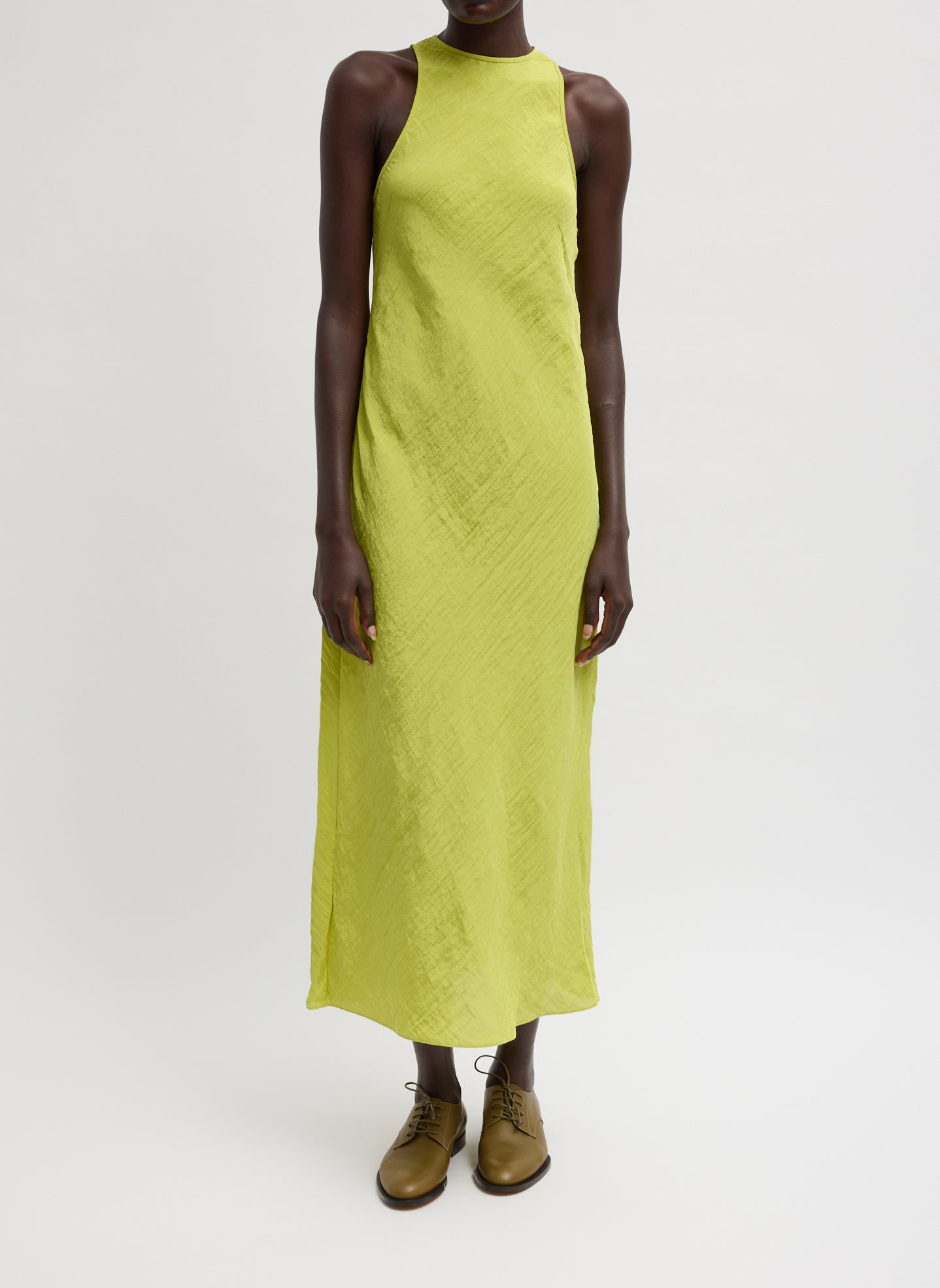 The Crinkle Slip Midi Bias Dress - Chartreuse Green Crinkle Slip Midi Bias Dress - front view on model