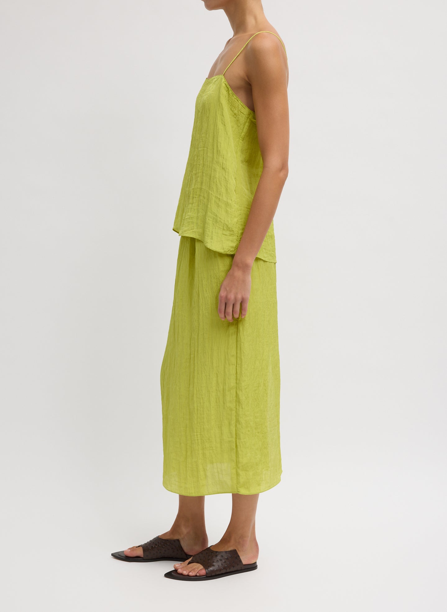 Chartreuse Green Crinkle Slip Skirt - silk midi skirt, side view on model