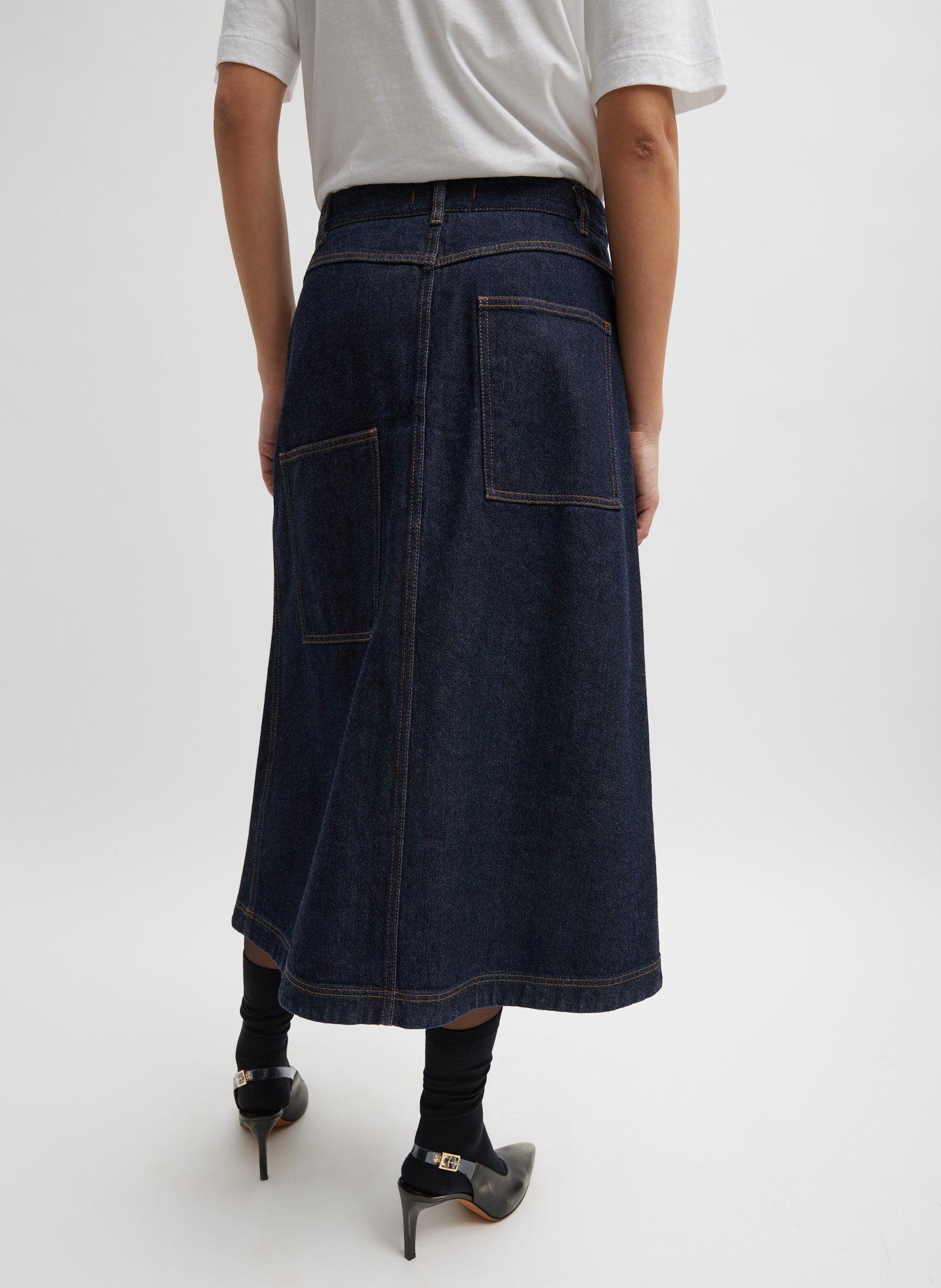 Indigo Denim Midi A-Line Skirt - dark wash, back view on model