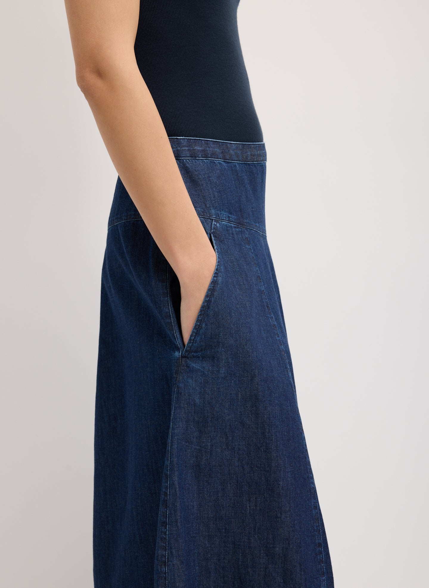 Light Weight Indigo Denim Asymmetrical Balloon Skirt - closeup of side pocket detail